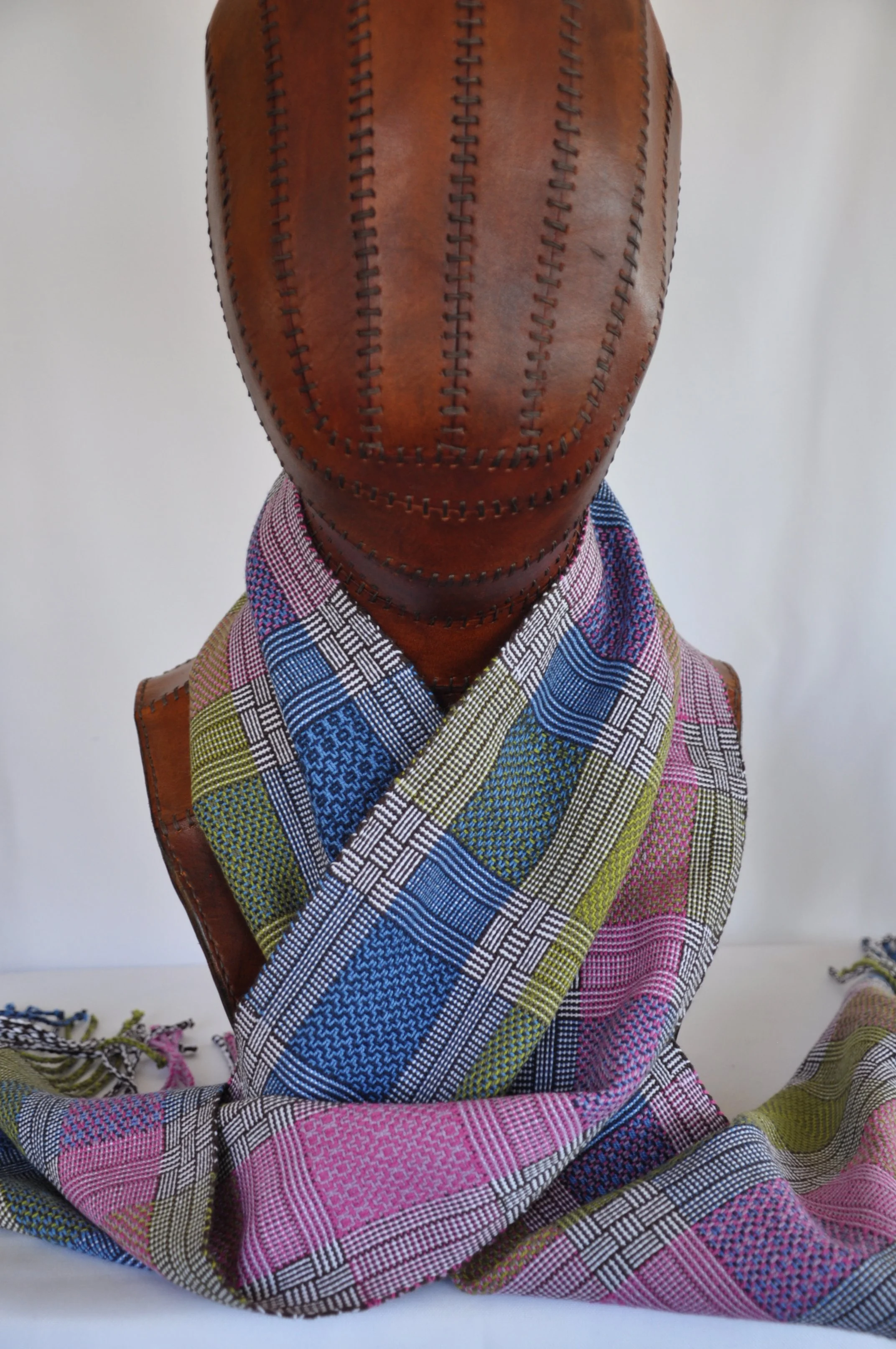 One of my favourite weave patterns featuring log cabin and varying twills.  This scarf is woven in cotton on an 8 shaft loom.