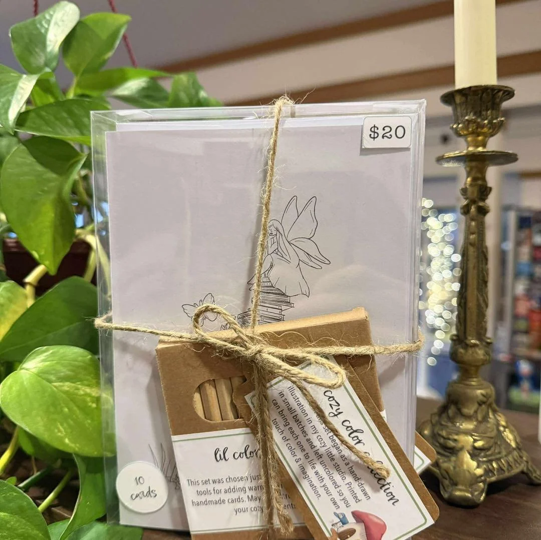 A little bookish joy has found a shelf I love.

You can now find some of my color-your-own card sets, reading logs, greeting card sets, and notepads tucked into the cozy corners of Hundred Acre Books.

Pop into today. Visit the cats, grab a book or s