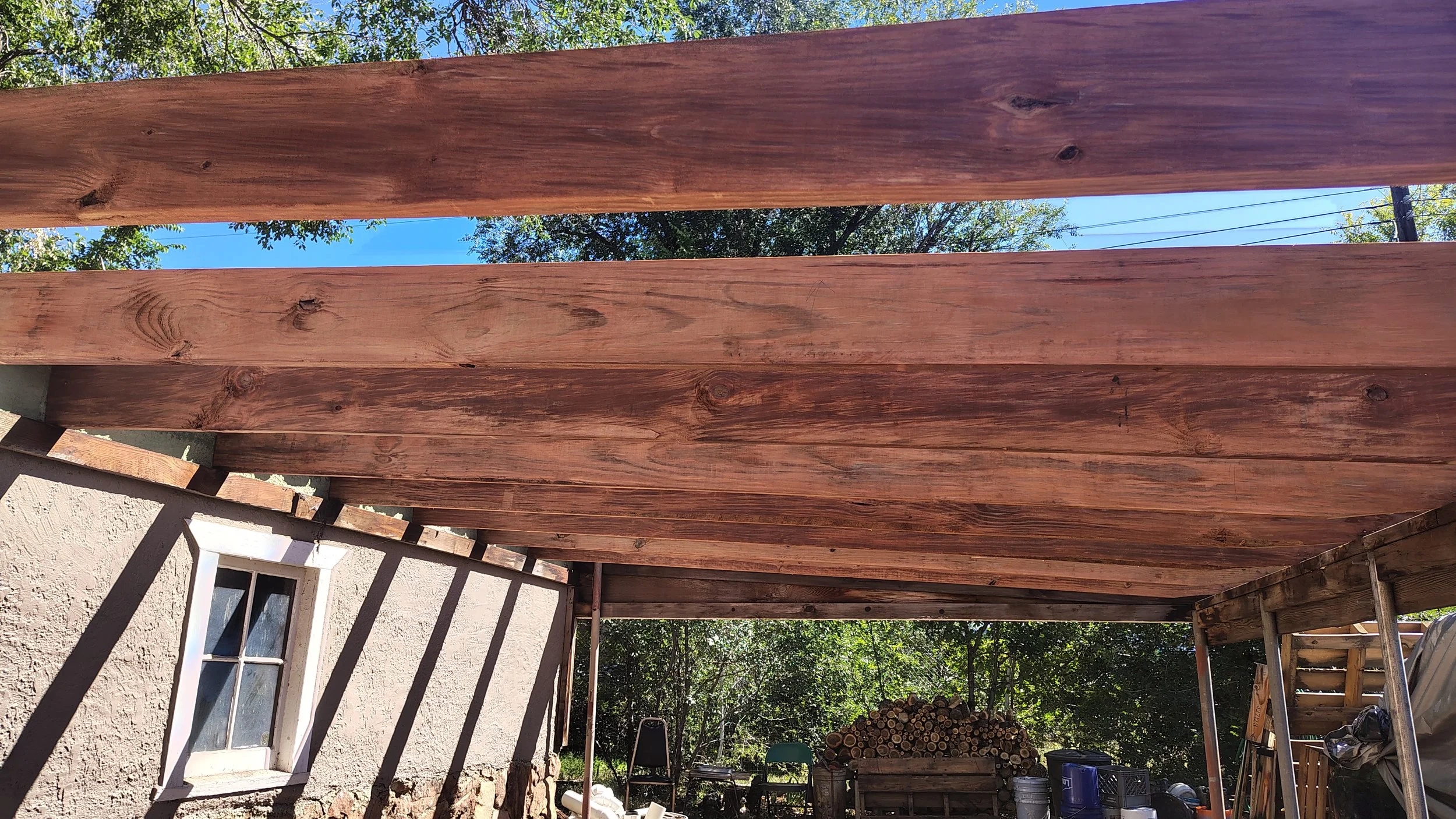 Carport roof rebuild after replacing rafters