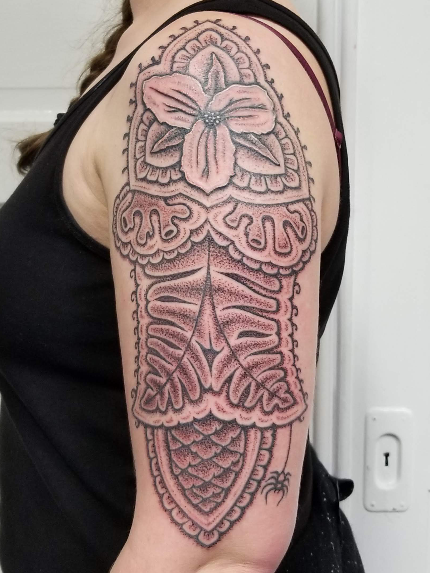 rachael arm floral-ornament close up.png