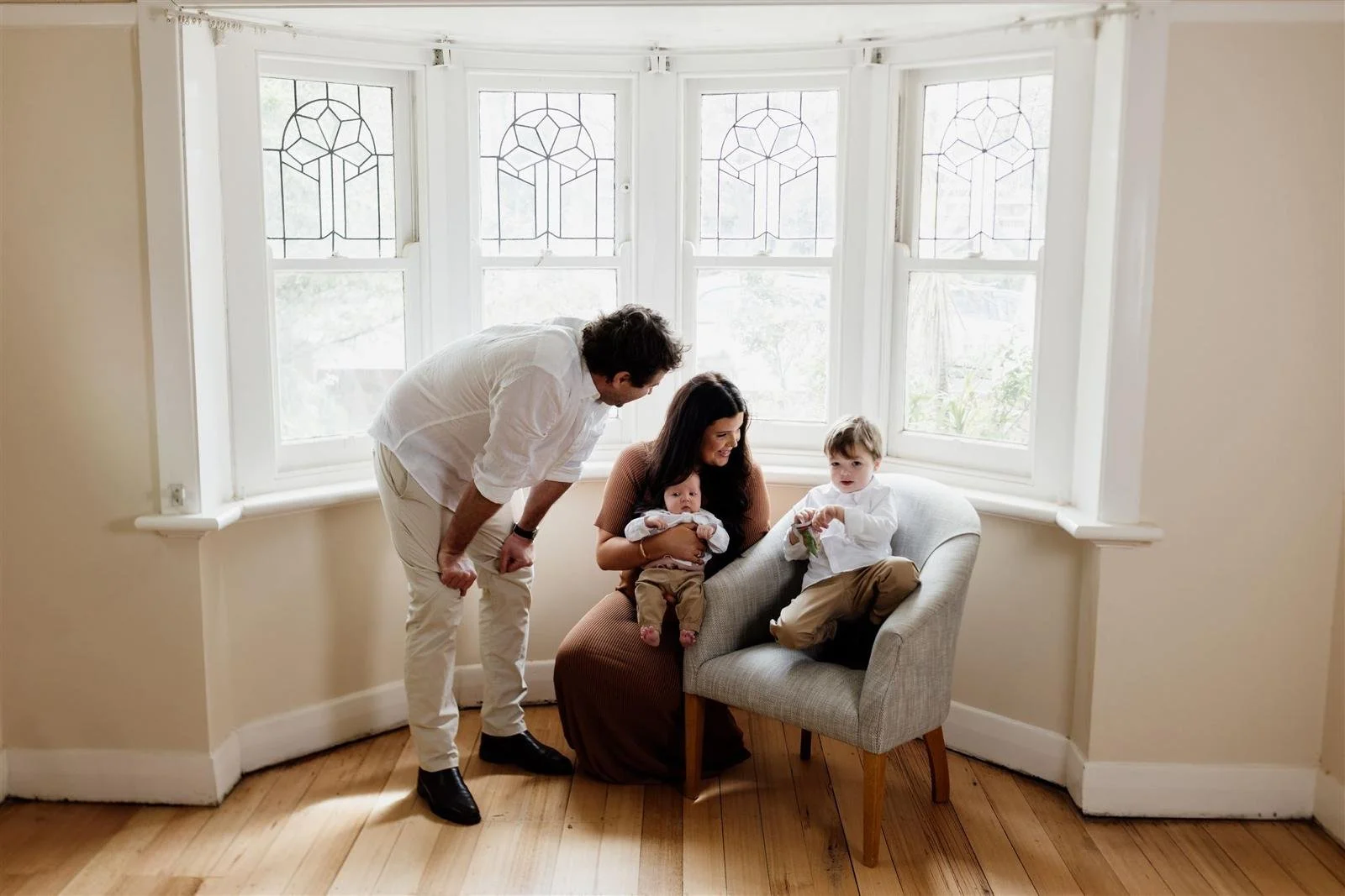 Emmaline with her two boys and her partner