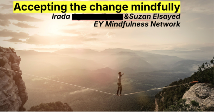 A person walking on a tightrope between two mountain cliffs during sunset or sunrise, with a scenic view of mountains and clouds in the background. The image includes a motivational message about accepting change mindfully.
