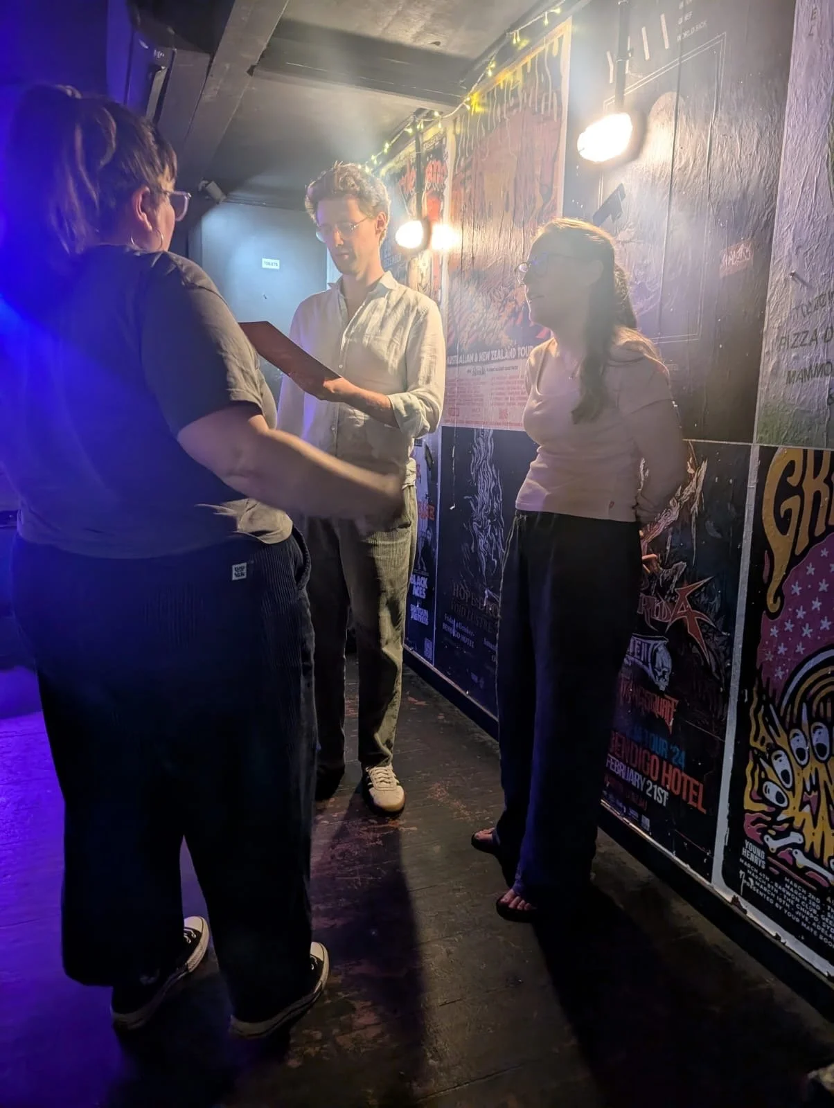 Players having private conversations during the day period of a game of Blood on the Clocktower.  Time used to share information to try and solve the game for the Good team or to hinder this is part of the Evil team