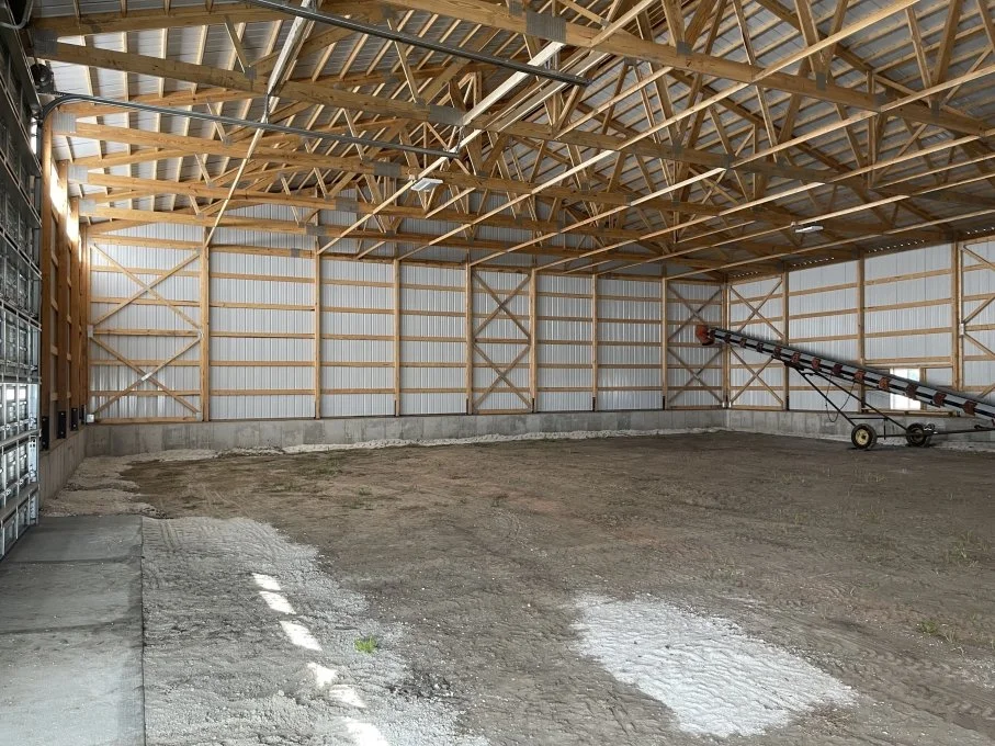 Post-frame wall structure designed for strength and stability