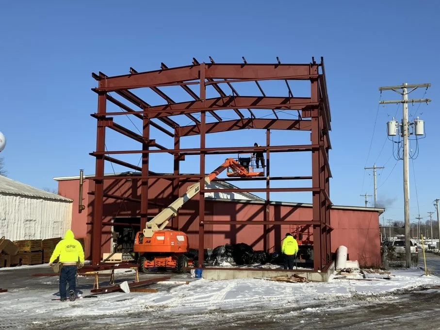 Steel frame building under construction showing structural framework