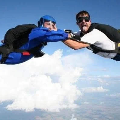 Father and son skydiving together