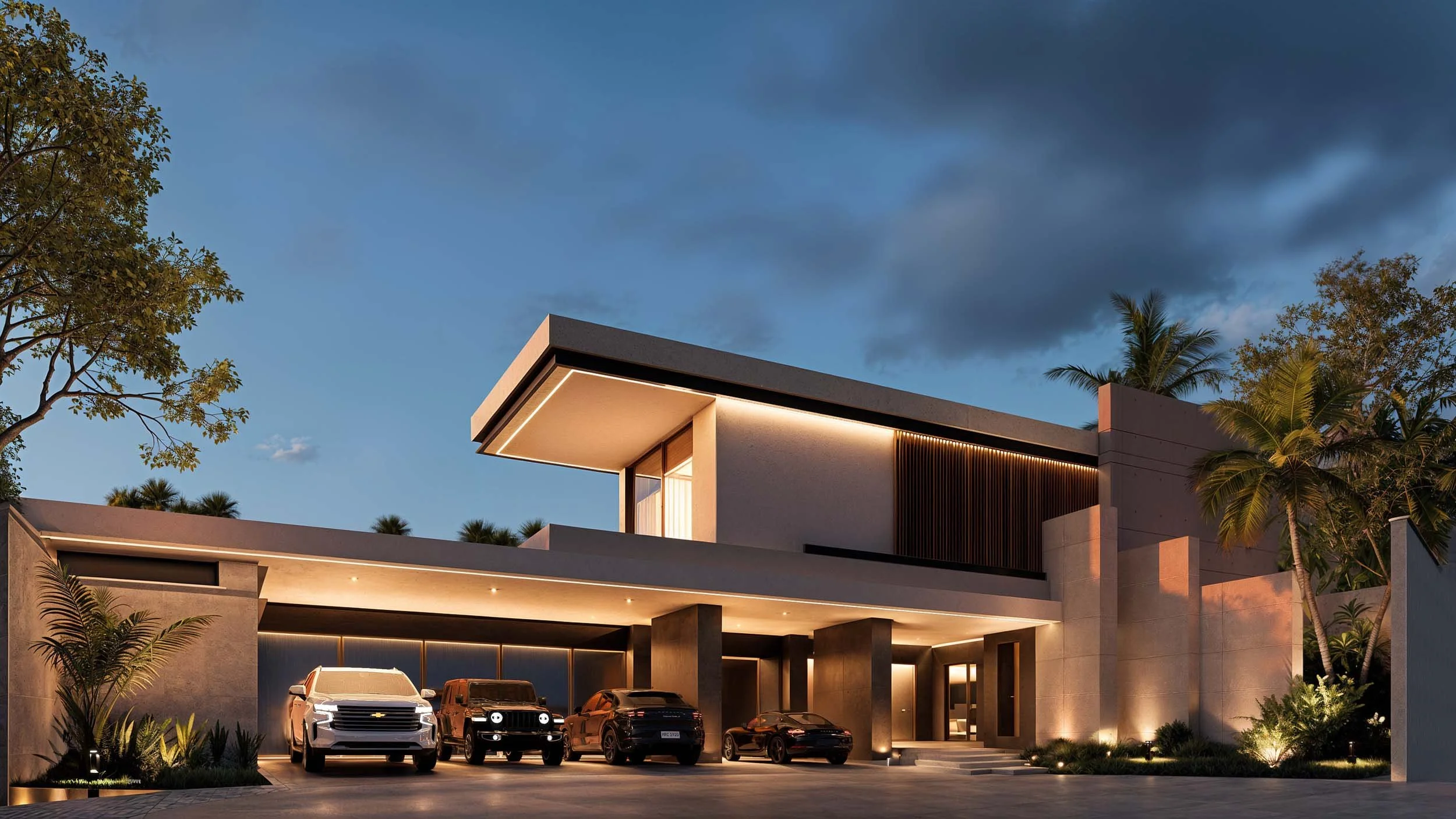 Diseño y construcción de mansión moderna de alto nivel en Tapachula por la firma Aven Haus, mostrando detalles de iluminación exterior y cochera para múltiples vehículos.