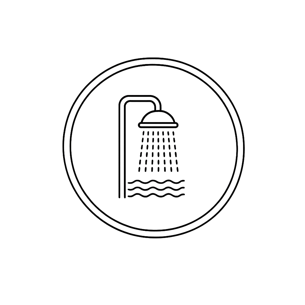 Icon of a showerhead with water spraying down into water, enclosed in a circle.
