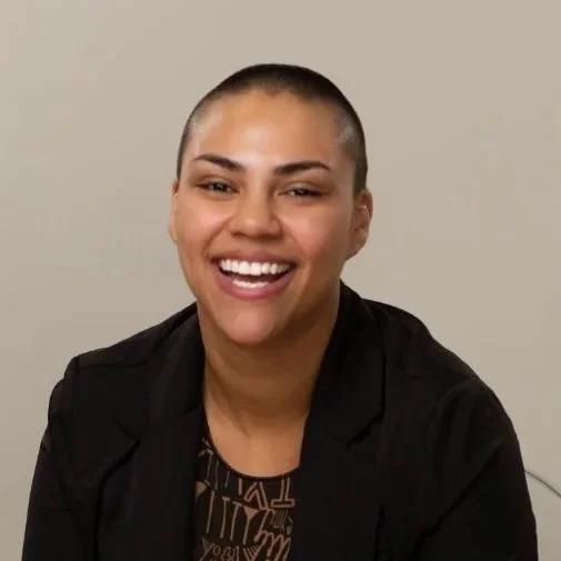 Portrait of Angela, writer, speaker, and creator of itslikeangela, focused on emotional healing and personal growth