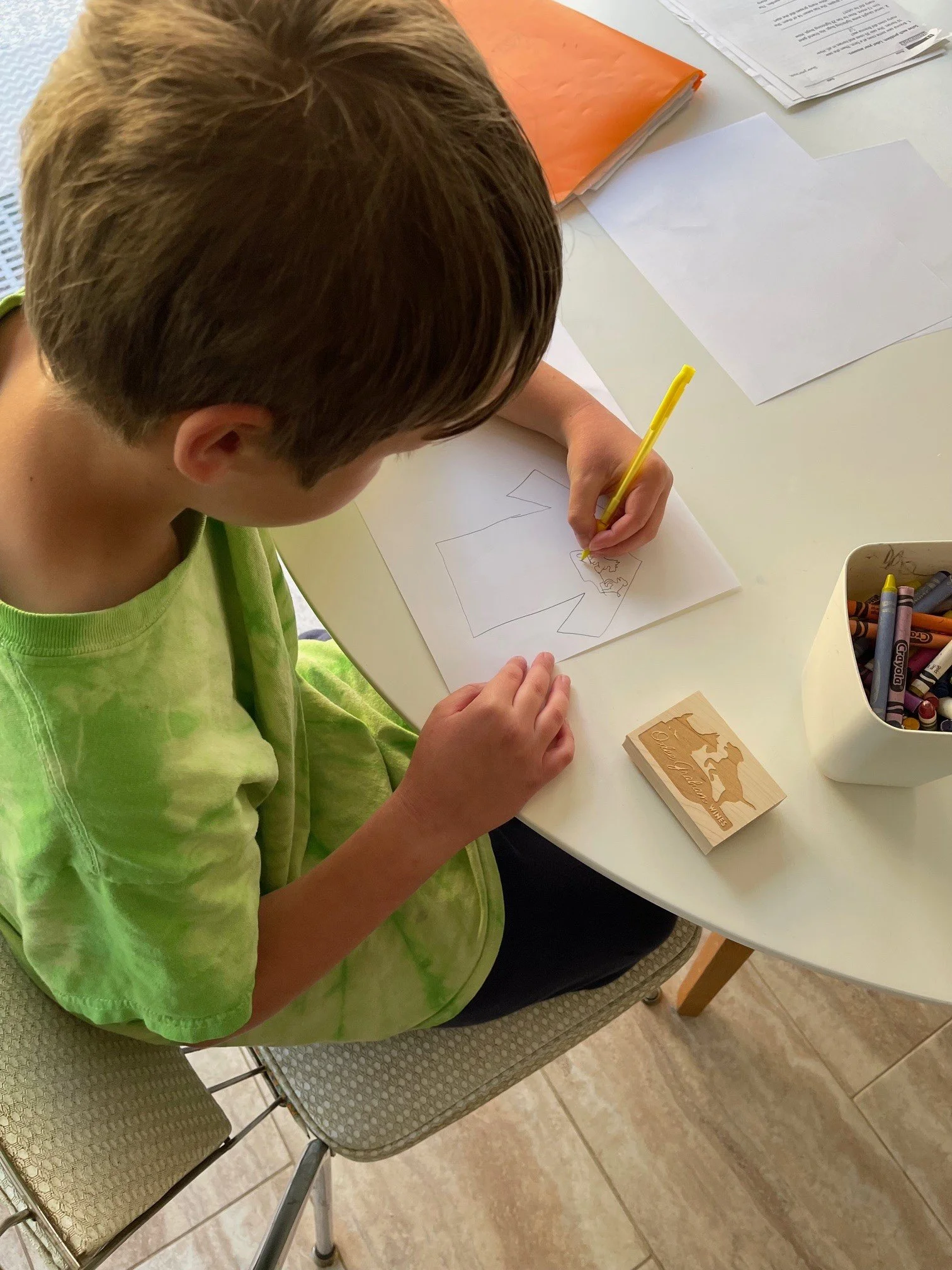 Kavan designing OG t-shirts.