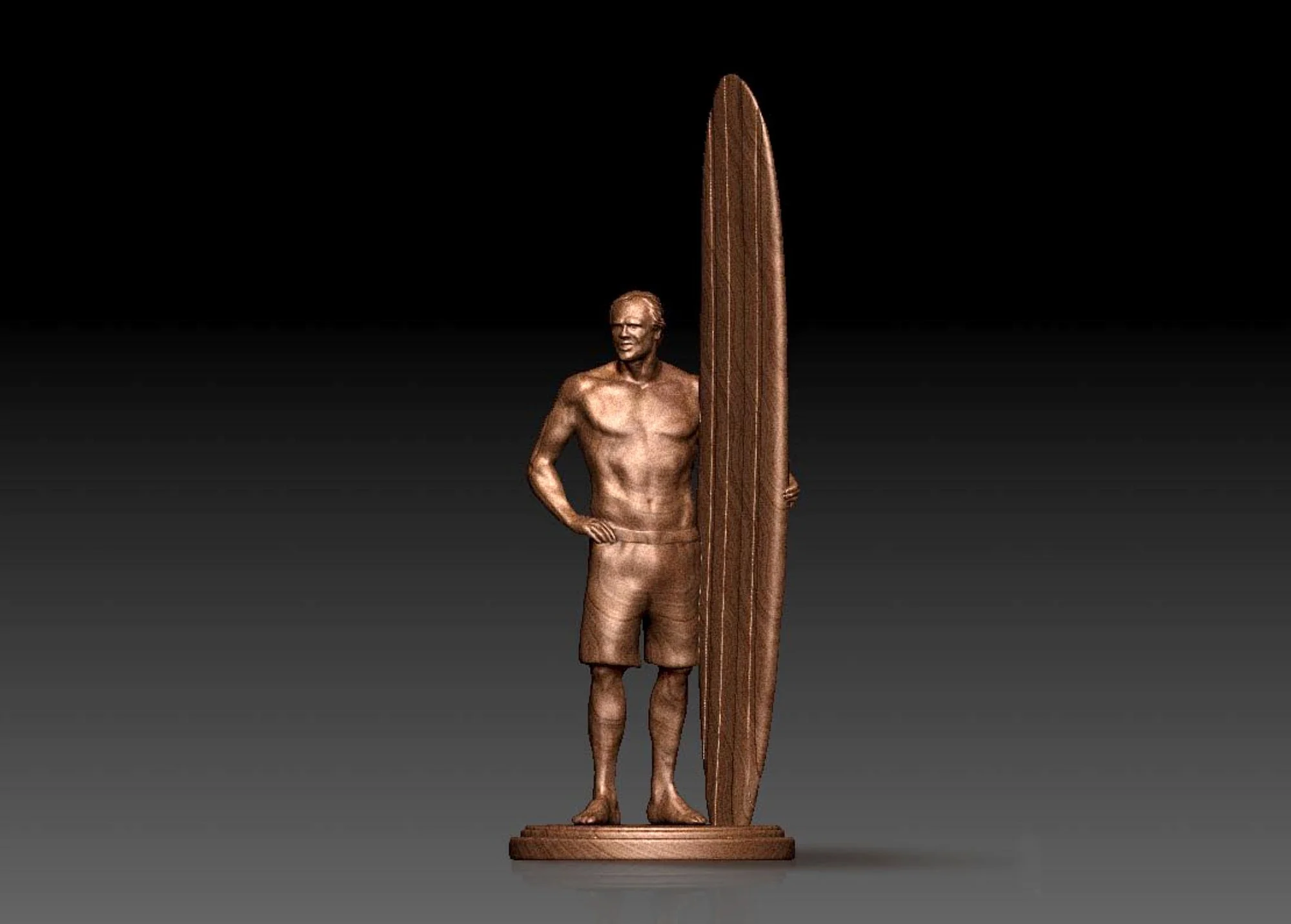 Bronze statue of a man in swim trunks holding a surfboard, standing on a base against a dark background.