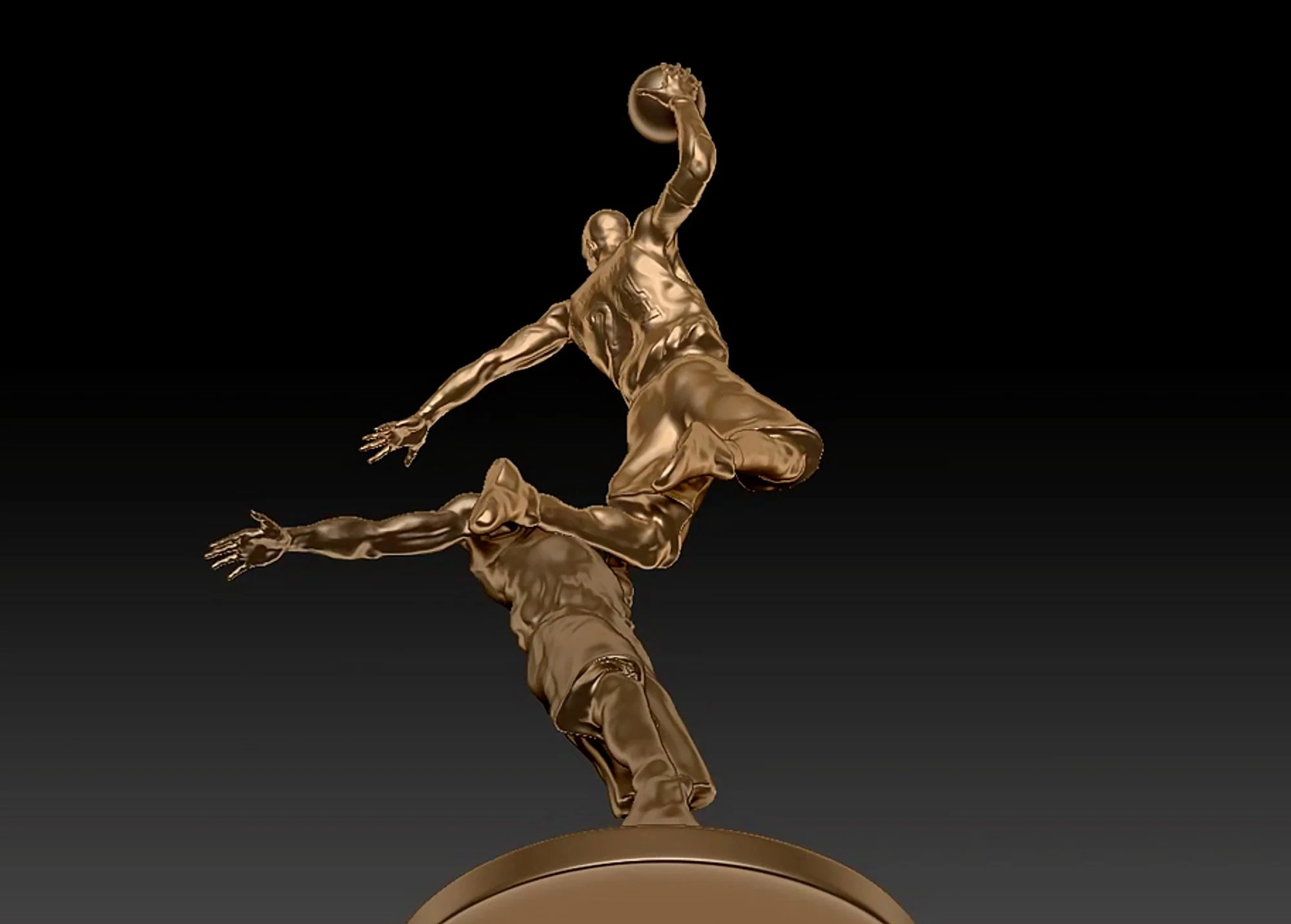 Golden statue of a basketball player mid-air attempting a slam dunk against a black background, mounted on a round base.