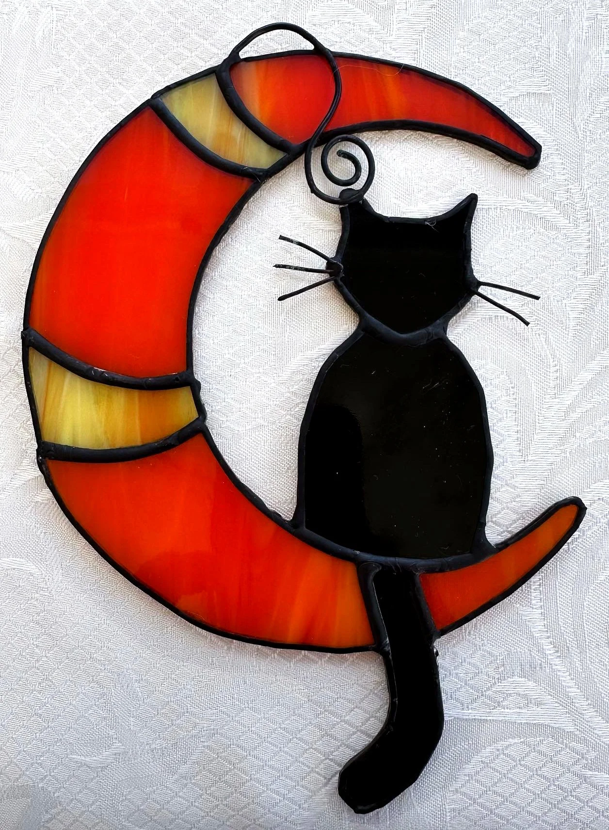 cat-on-orange-yellow-moon.jpg
