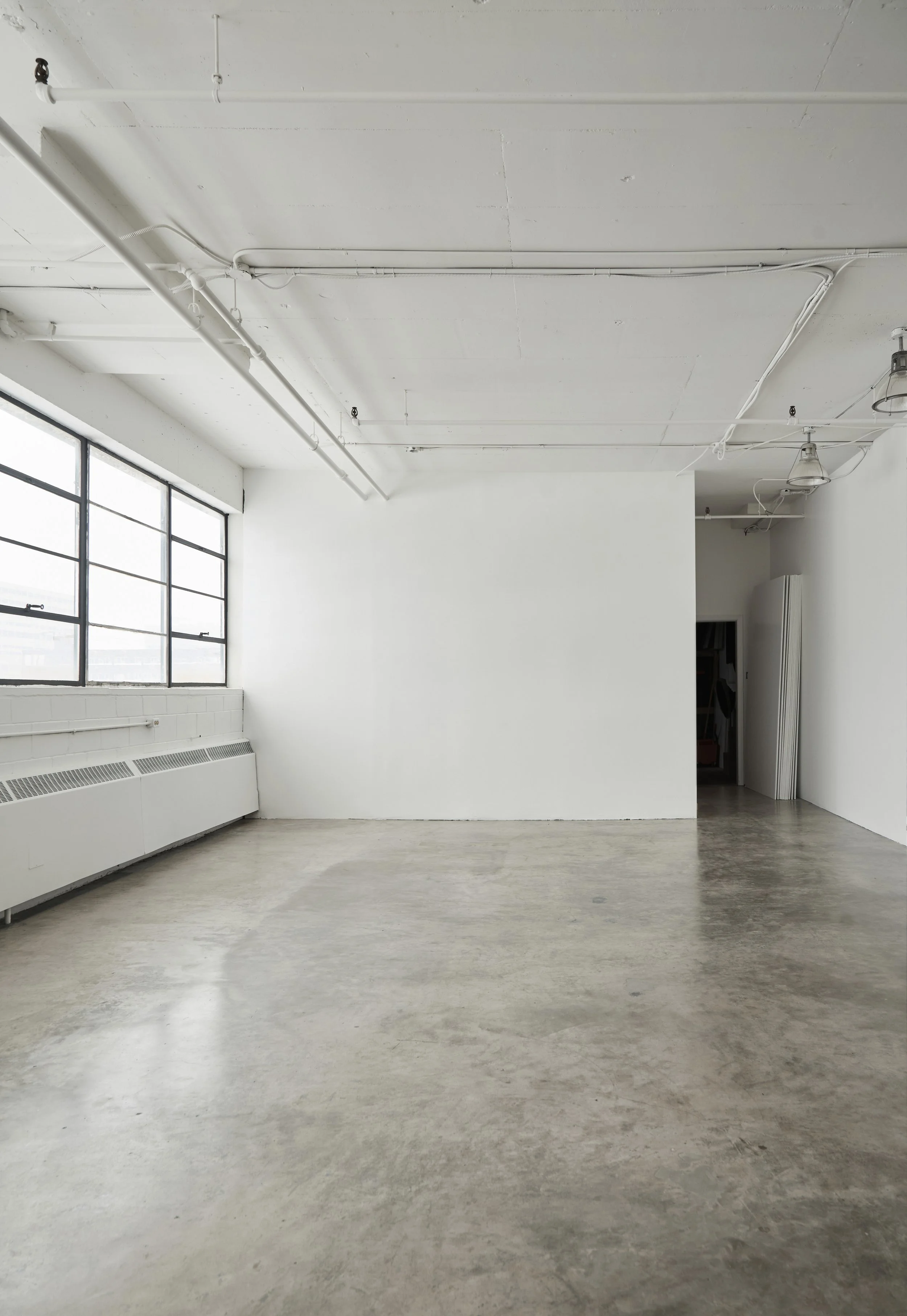 Louvain Shooting Wall_Vertical_Clean.jpg