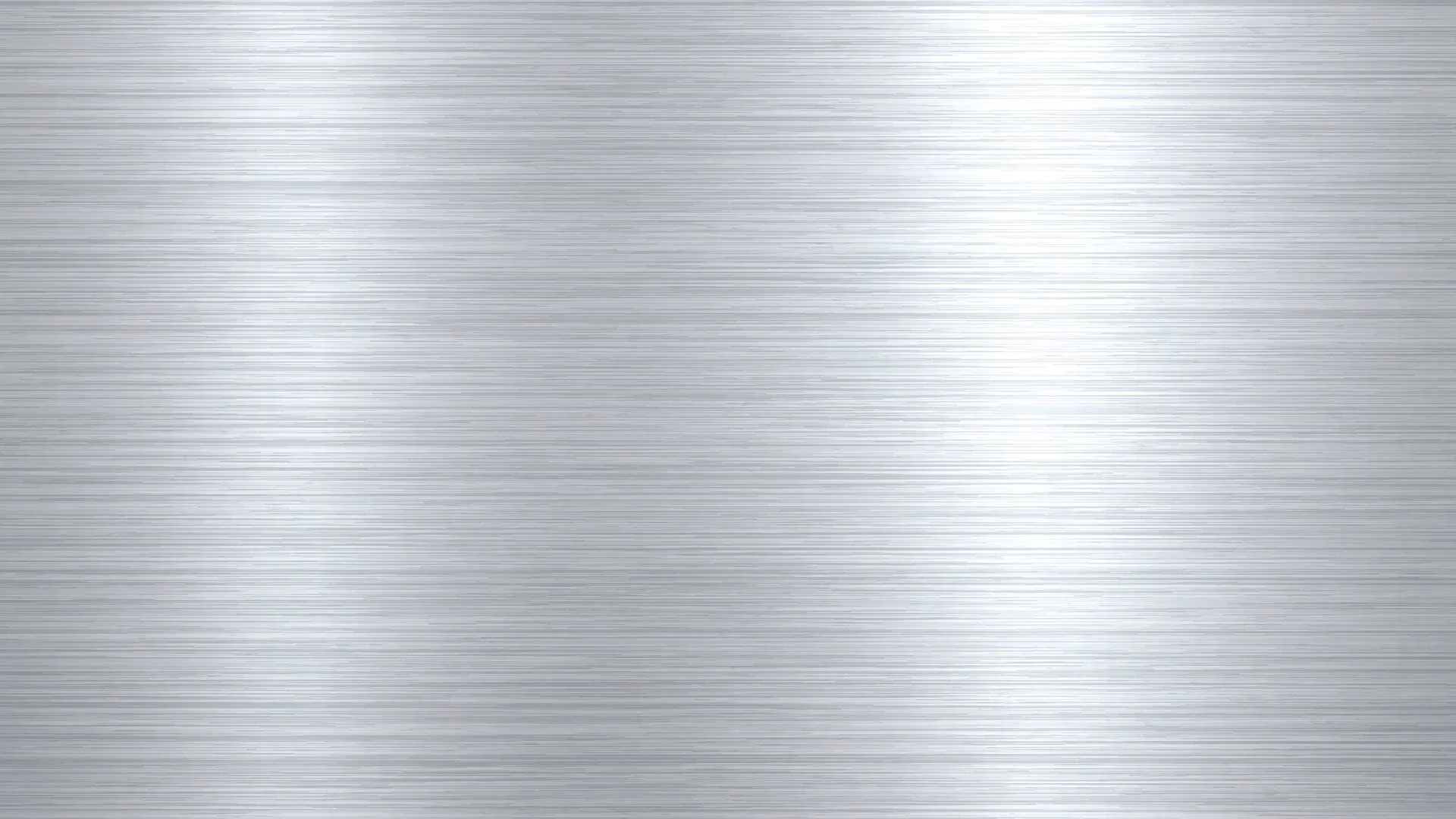 A brushed metal surface with horizontal lines and a shiny, reflective finish.