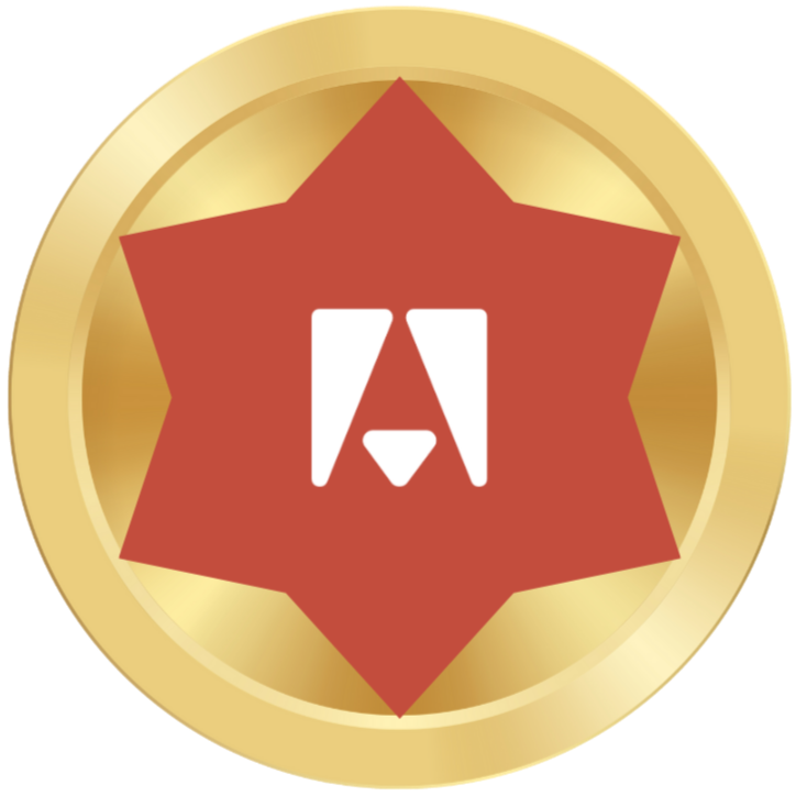 Medalla dorada con un escudo de color rojo en forma de estrella de siete picos y un logotipo blanco en el centro que parece una letra A estilizada.