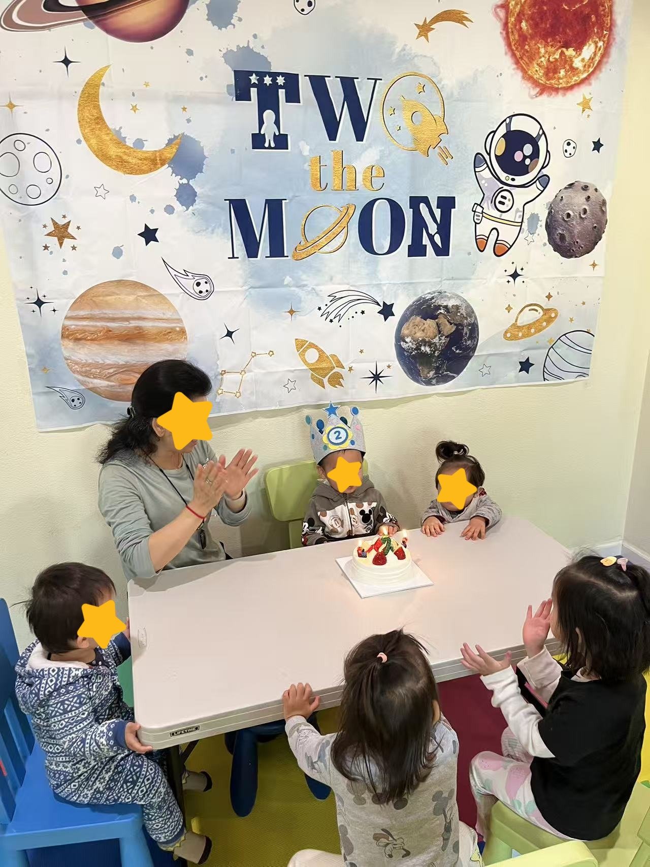 Children celebrating a birthday at Red Apple Daycare in Santa Clara, building social skills and a sense of community.