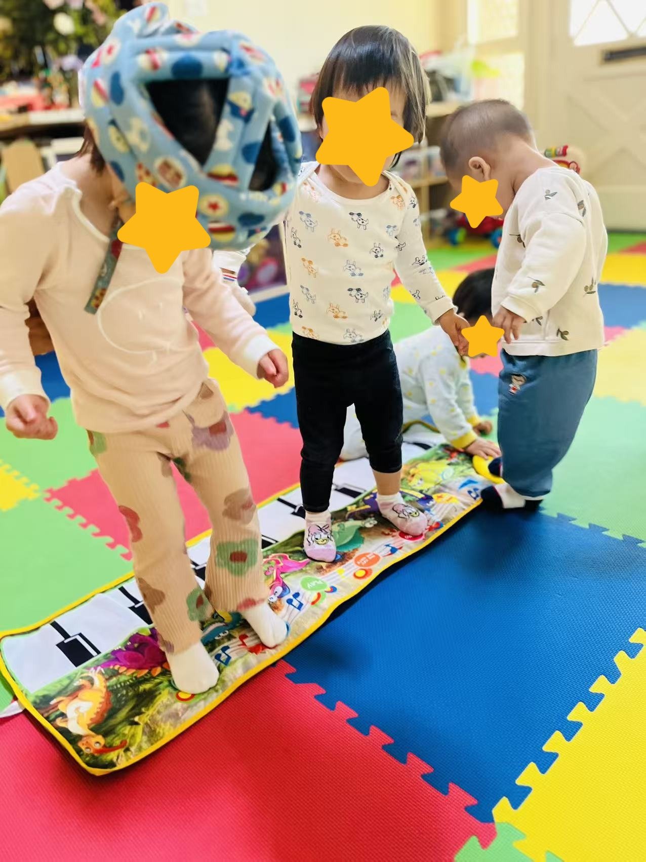 Children practicing balance activities at Red Apple Daycare, supporting coordination and gross motor development.
