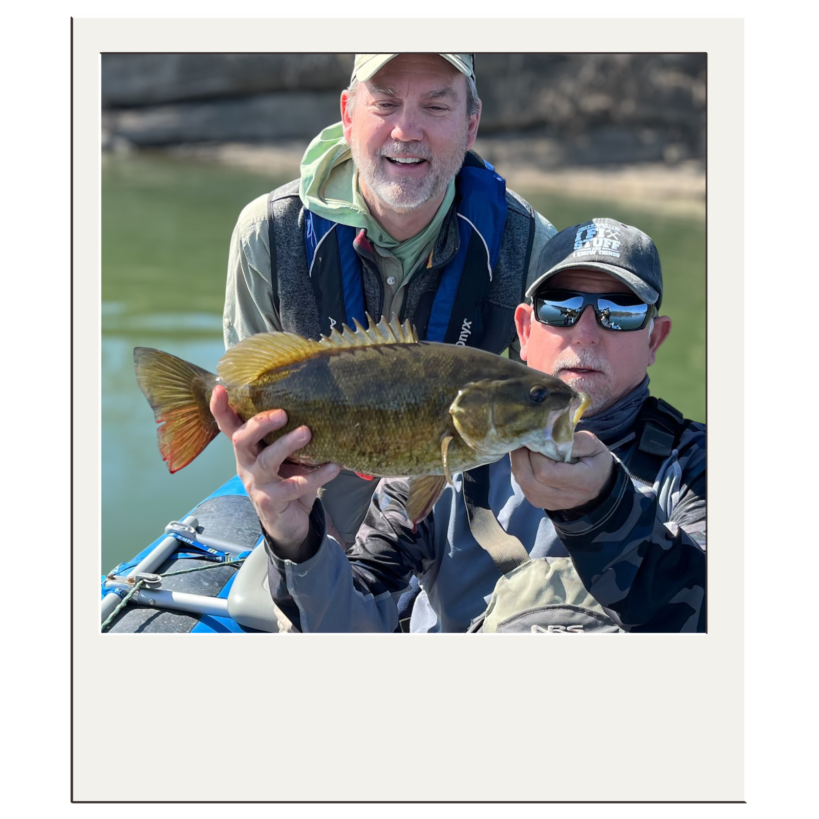Smiling angler after landing a large bass during a White Fly Outfitters guided trip in the northeast panhandle.