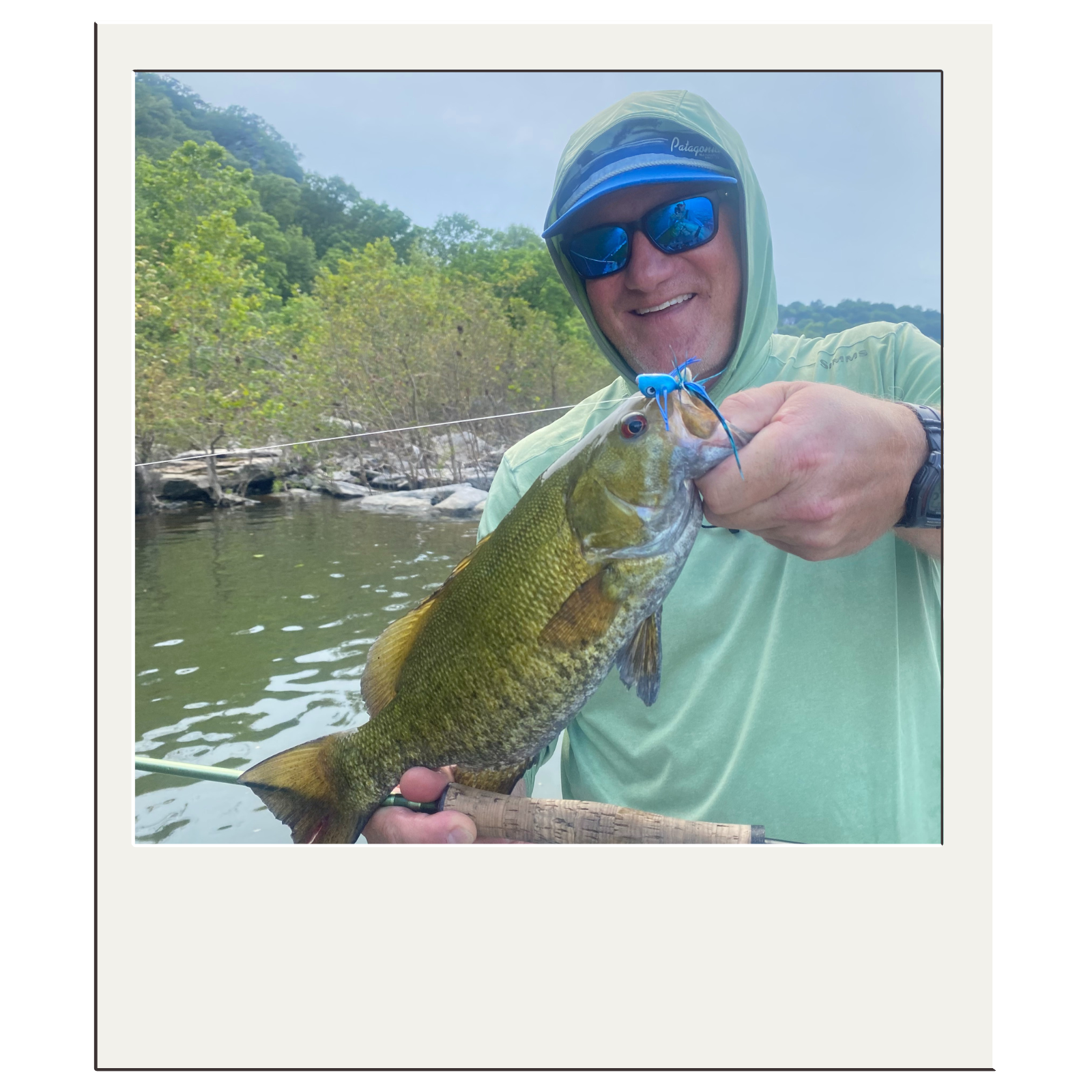 Catch-and-release smallmouth bass fishing on calm Harpers Ferry waters.