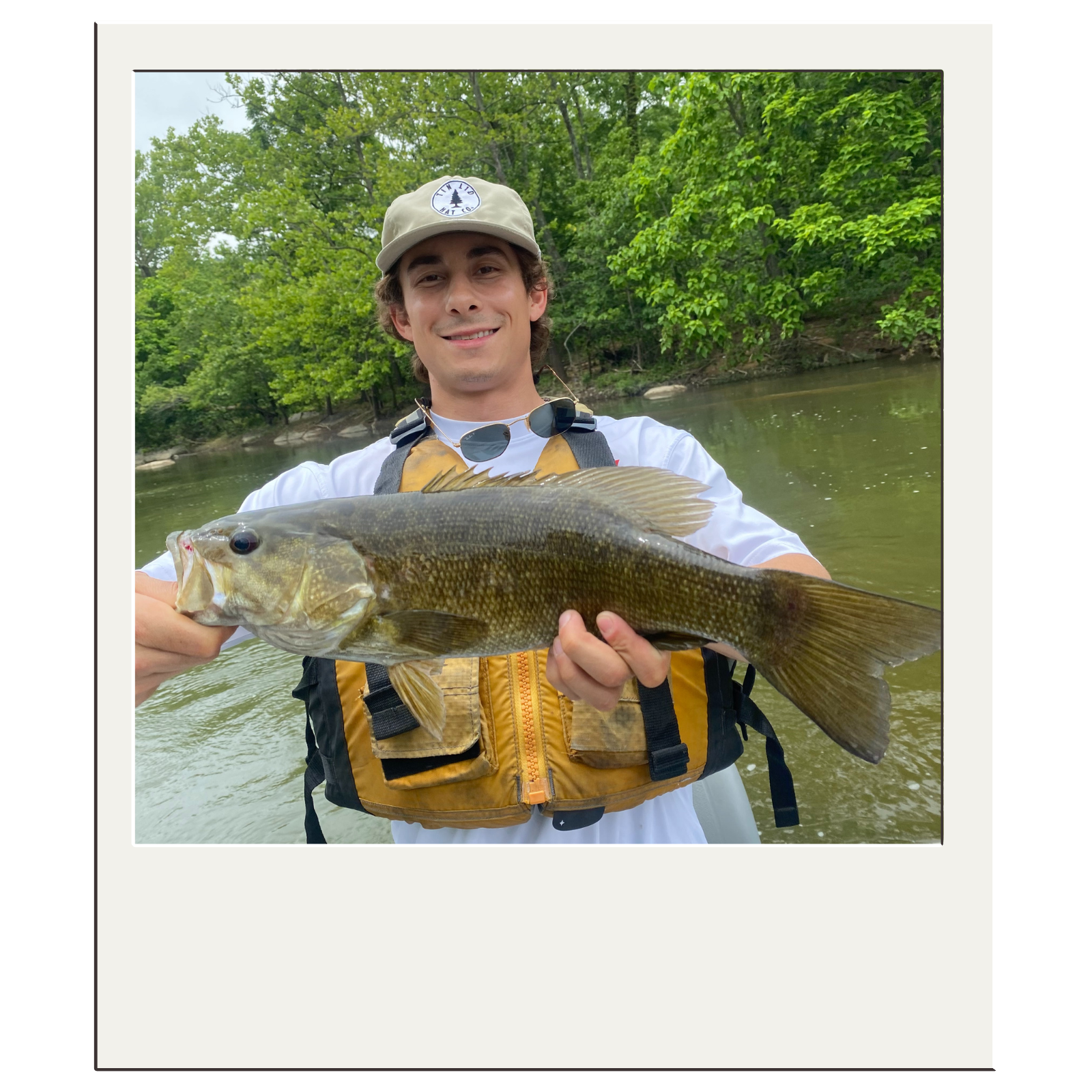 Fly-fishing client proudly displaying catch-and-release bass near Harpers Ferry, WV.
