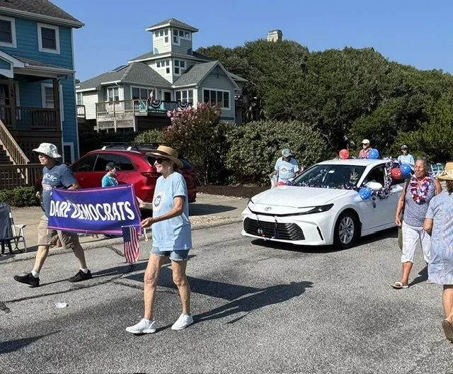 Duck Precinct walks in Duck’s July 4th Parade.
