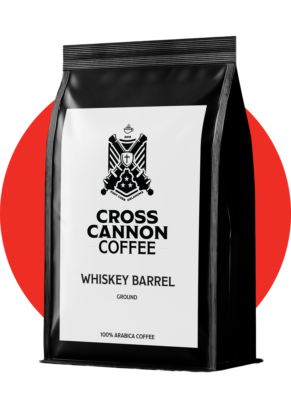 Black and white bag of Cross Cannon Coffee Whiskey Barrel ground Arabica coffee with a logo featuring crossed cannons and a shield, set against a red and green background.