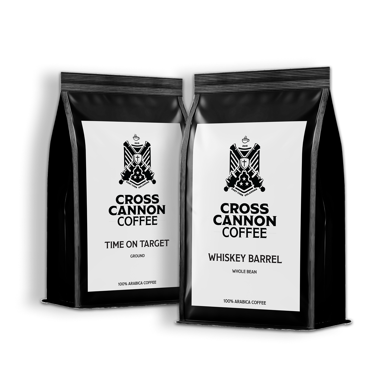 Two bags of Cross Cannon Coffee, one labeled 'Time on Target' ground blend and the other labeled 'Whiskey Barrel' whole bean, featuring a black and white design with a logo of crossed cannons and a cross.