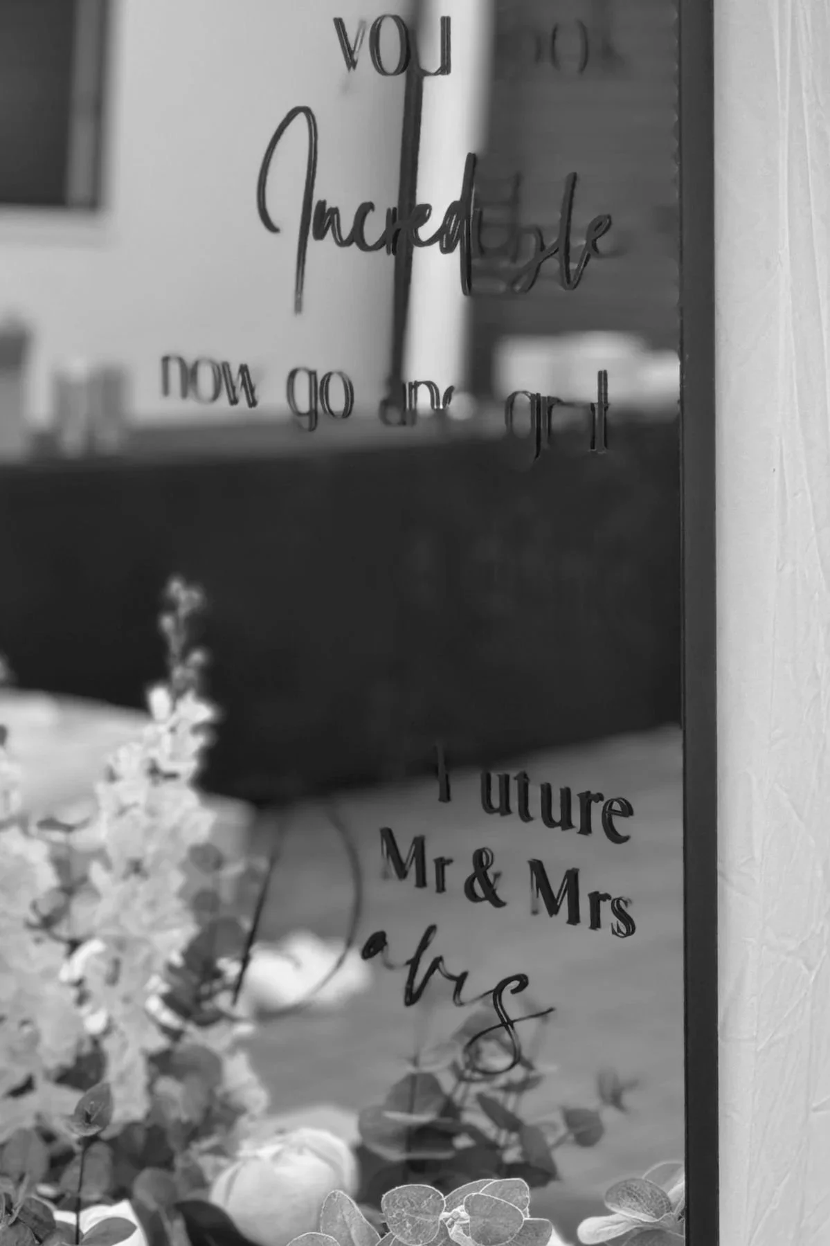 Engagement mirror signage detail with floral styling Gold Coast