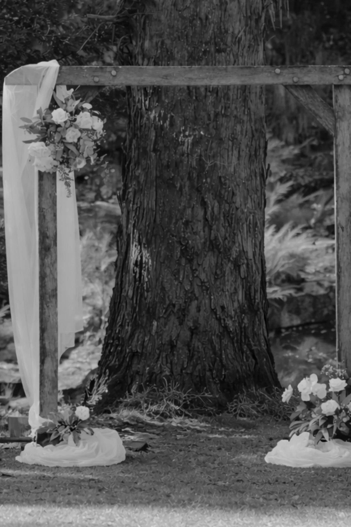 Outdoor wedding ceremony arbour styling Gold Coast