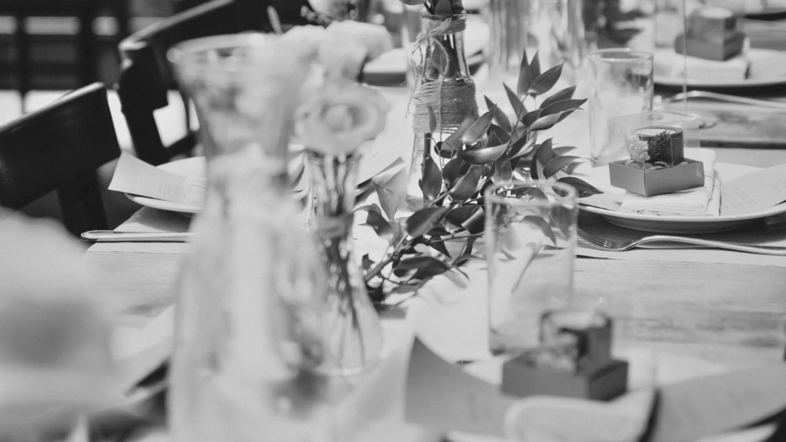 Black and white wedding table styling with florals and place settings by Saudade Events, Gold Coast event stylist.