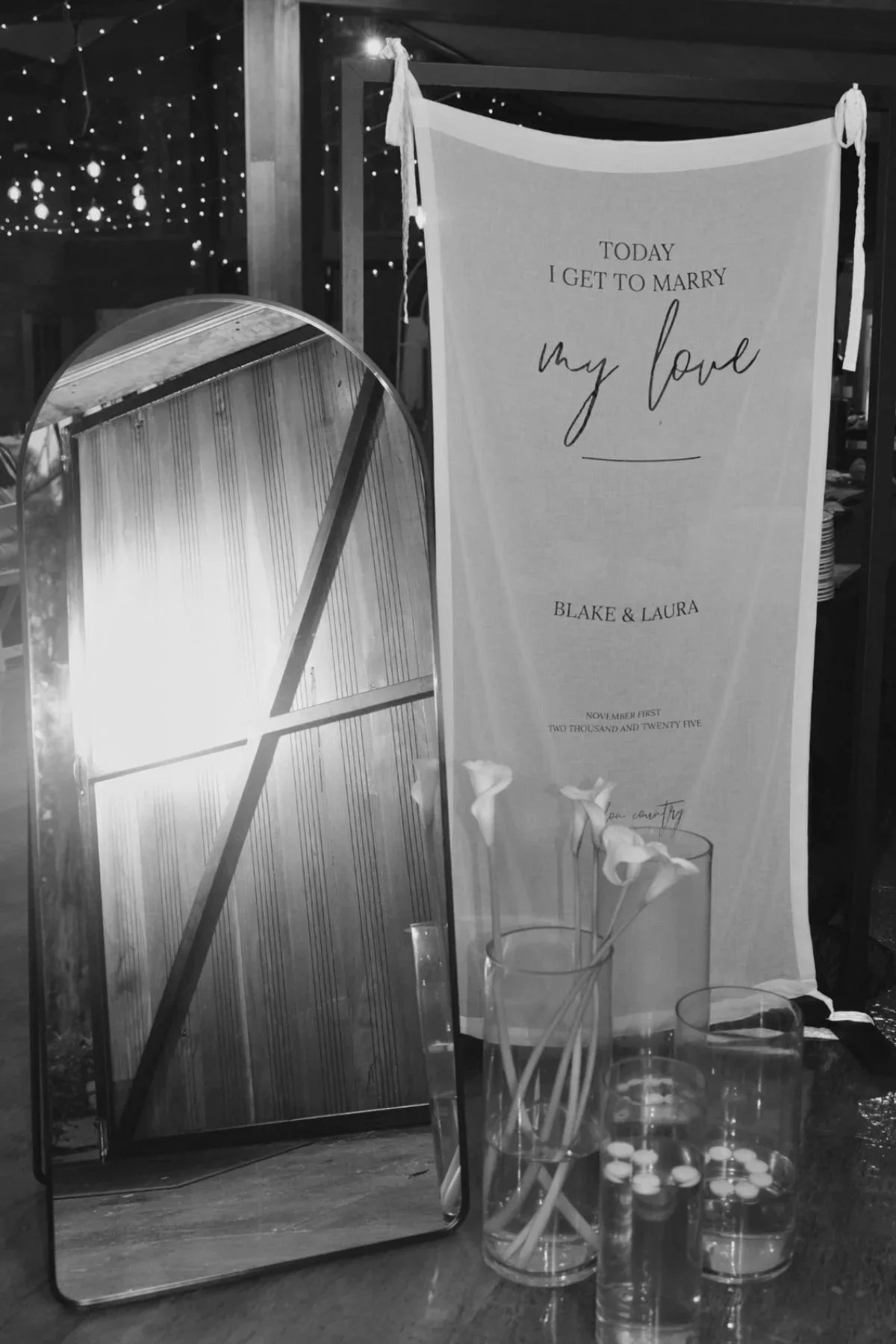 Custom wedding fabric signage and mirror styling detail by Saudade Events, Gold Coast wedding stylist.