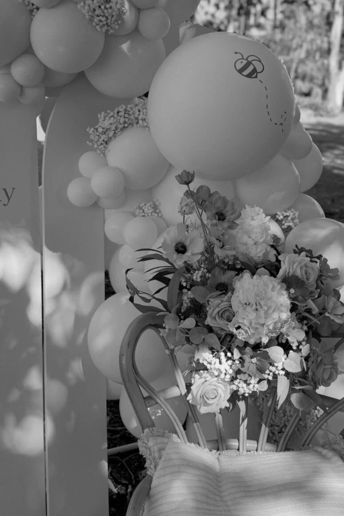 Organic balloon styling with layered florals for a Gold Coast celebration by Saudade Events.