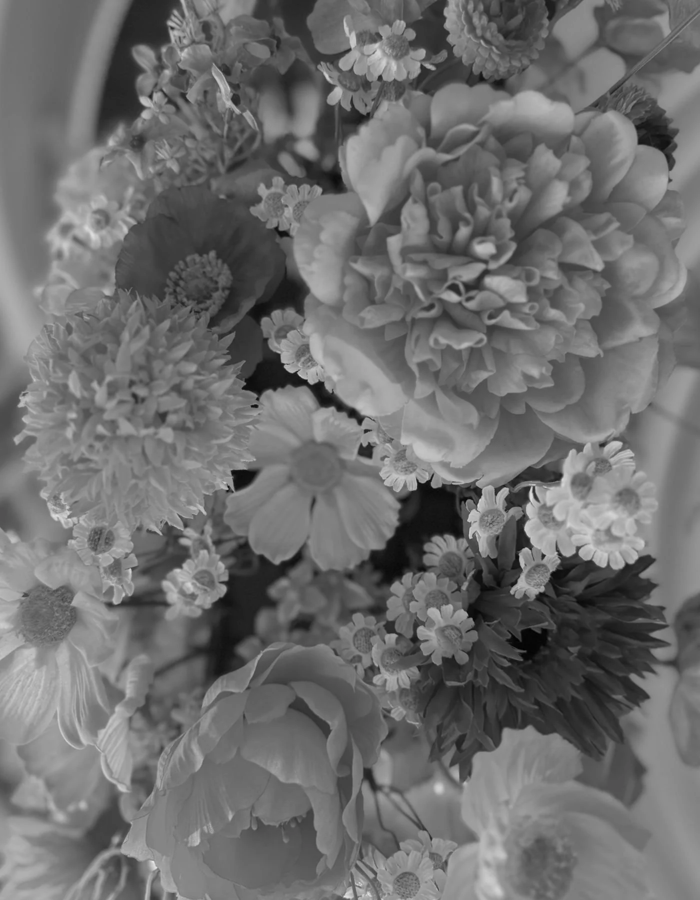 Close-up of textured wedding bouquet with layered white blooms and delicate floral detail by Saudade Events, Gold Coast florist.
