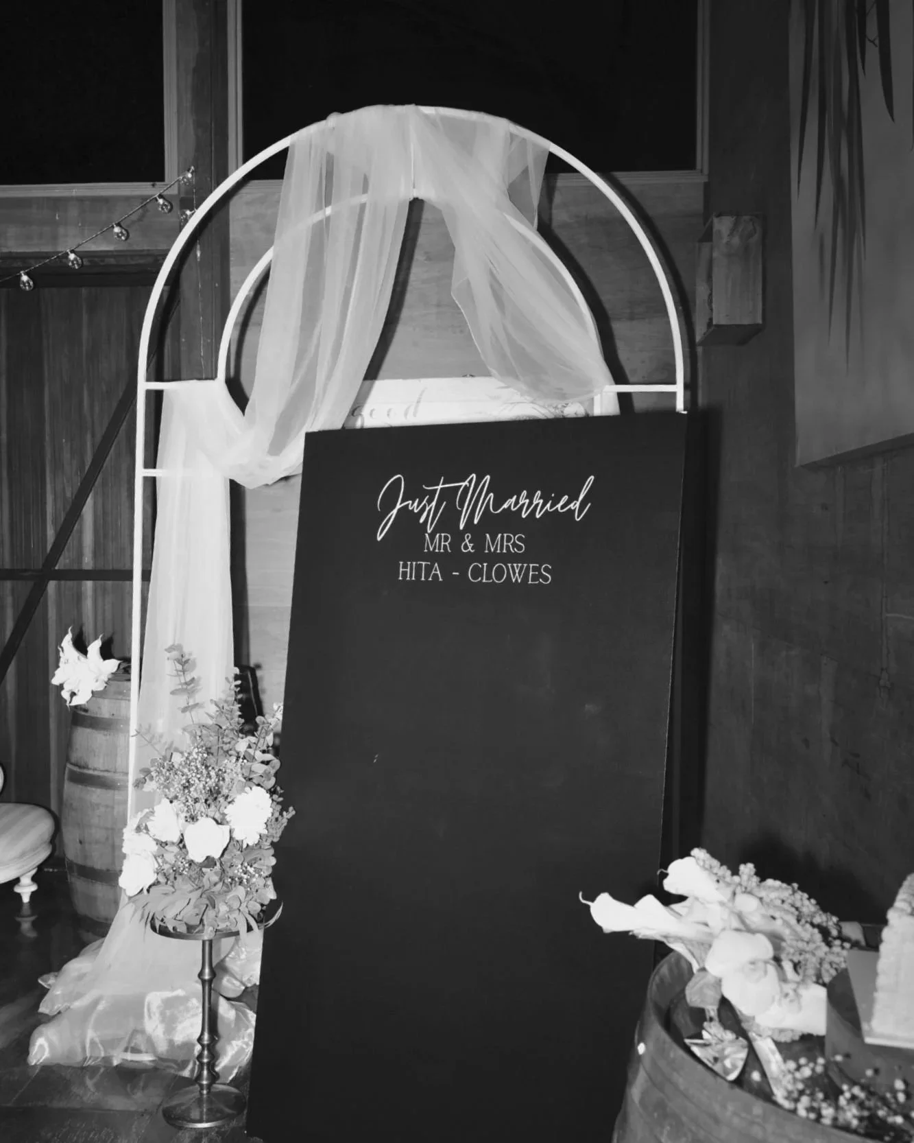 wedding welcome sign styling with florals and draping by Saudade Events on the Gold Coast.
