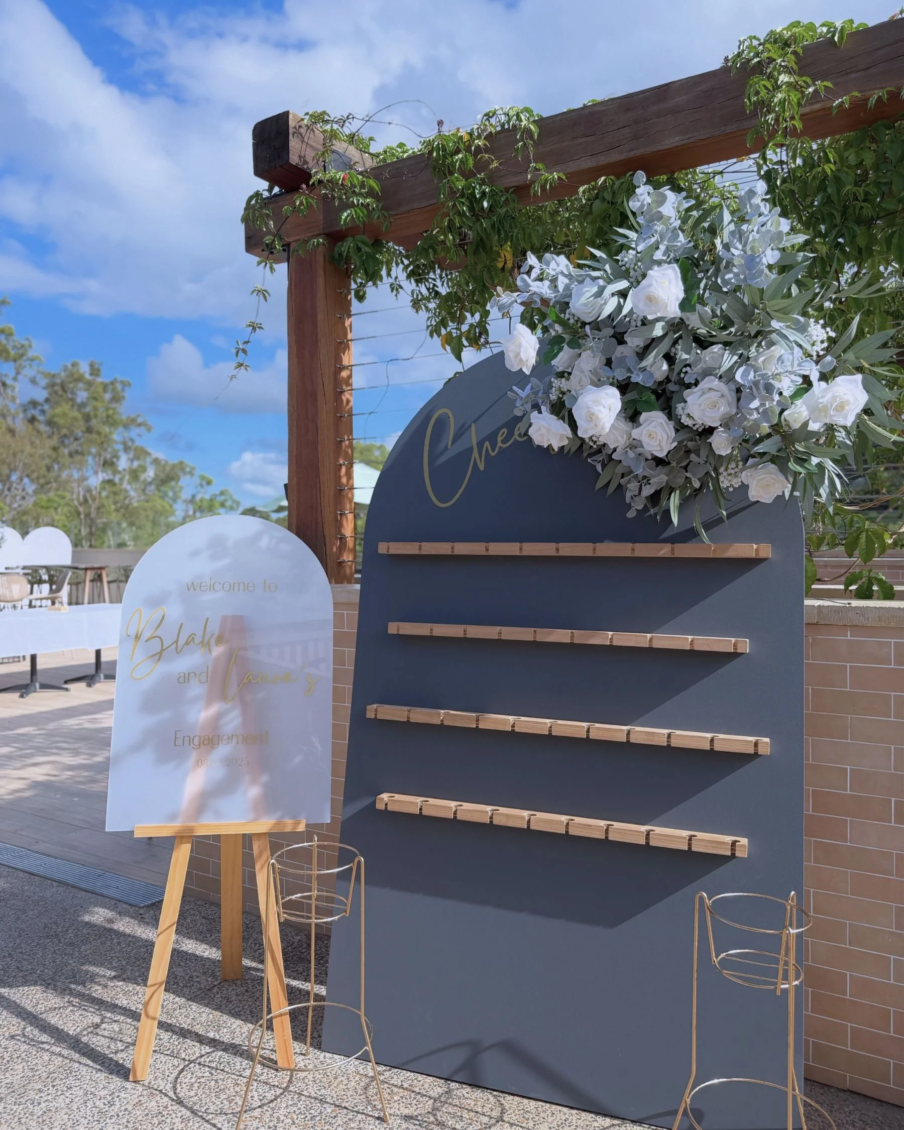 Custom champagne wall installation for an engagement at Tallai Golf Club on the Gold Coast.