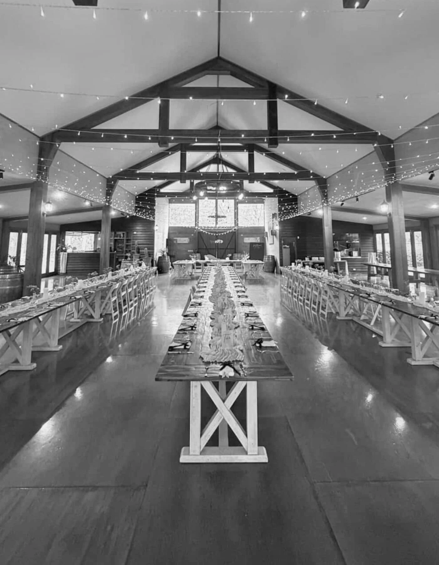Large wedding reception setup with long banquet tables and refined styling by Saudade Events, Gold Coast wedding stylist.