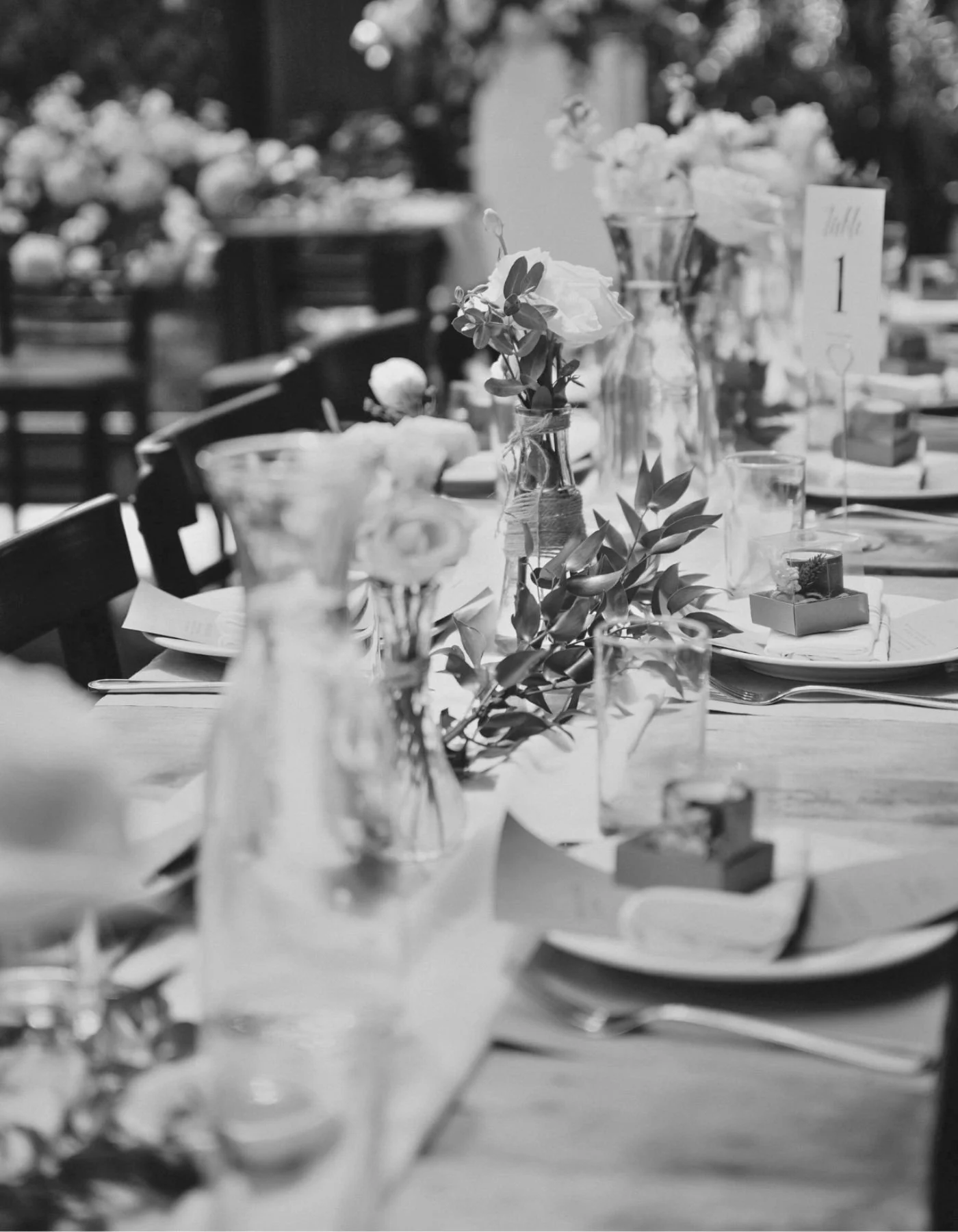 Elegant wedding reception table styling with florals and layered place settings by Saudade Events, Gold Coast event stylist.