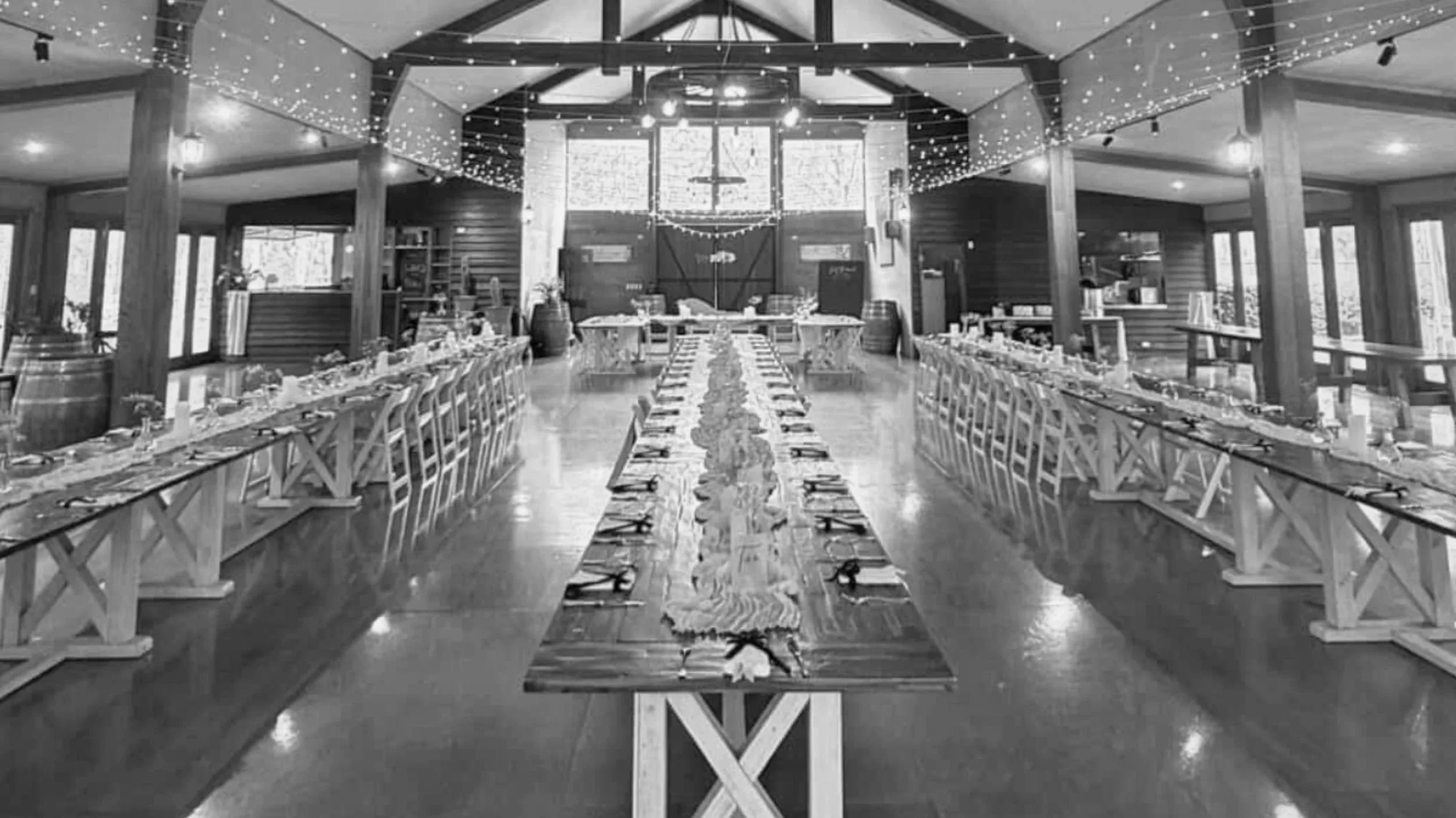 Luxury wedding reception styling in Gold Coast featuring long banquet tables, curated florals and refined on-the-day design by Saudade Events.