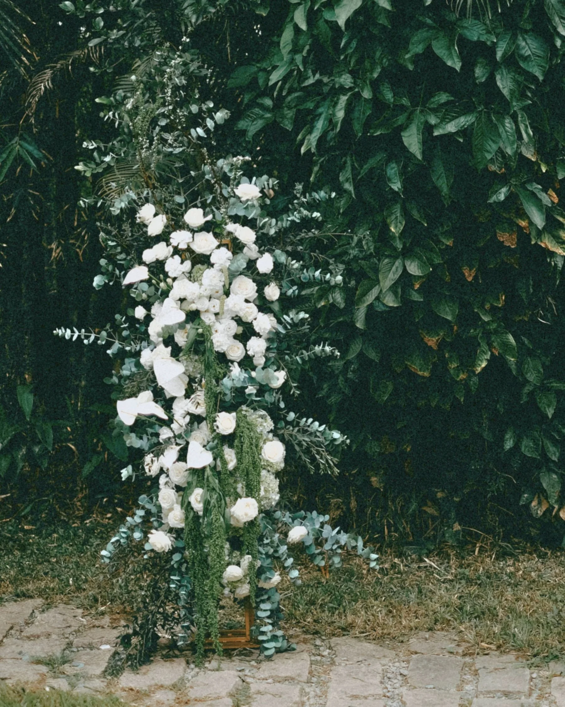 Wedding ceremony arbour floral installation styled on the Gold Coast.