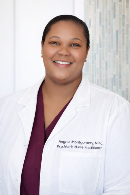A smiling black woman in a white coat with a name tag that reads Angela Montgomery, NP-C, Psychiatric Nurse Practitioner, standing in front of a light-colored patterned wall.