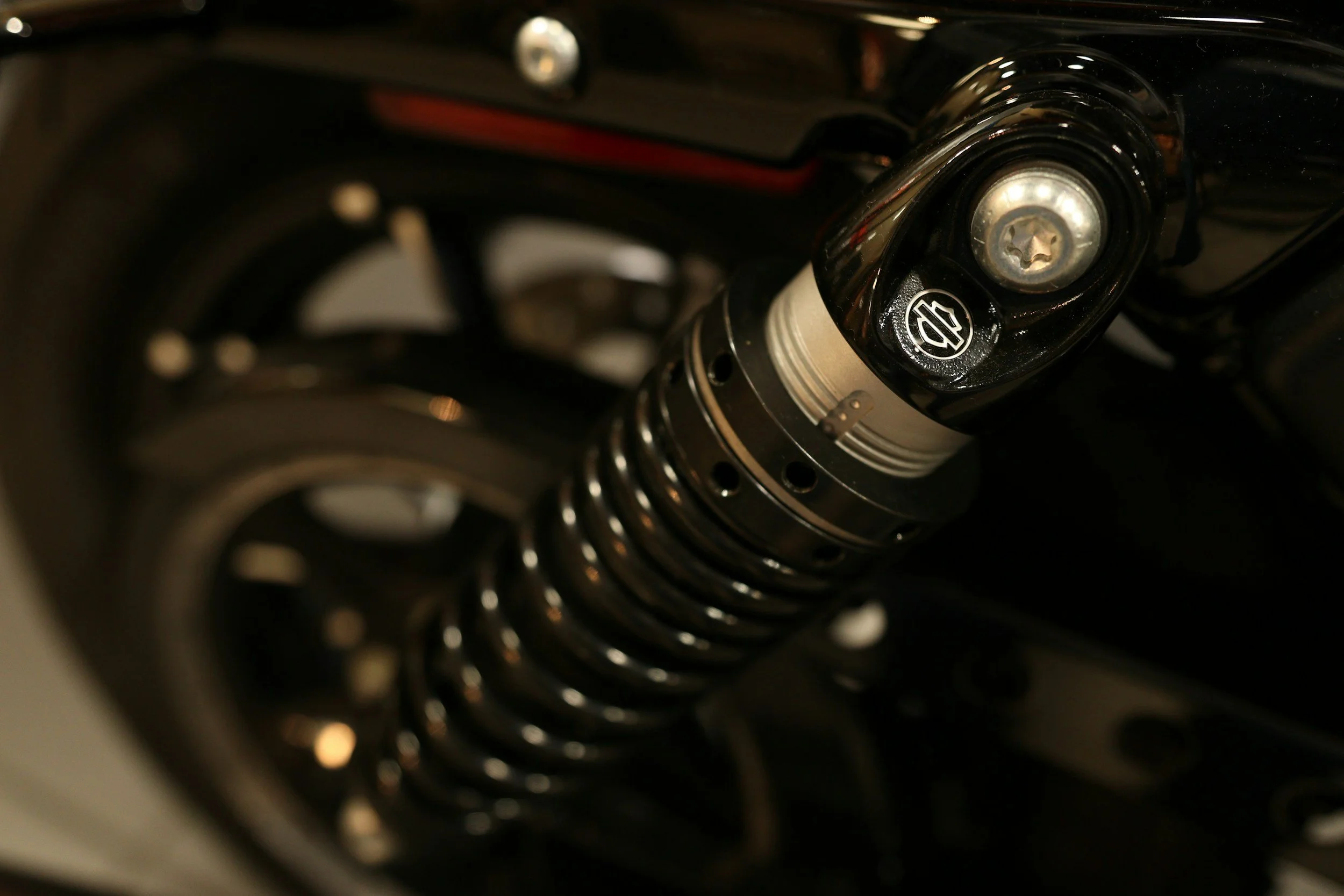 Close-up of a motorcycle suspension shock absorber.