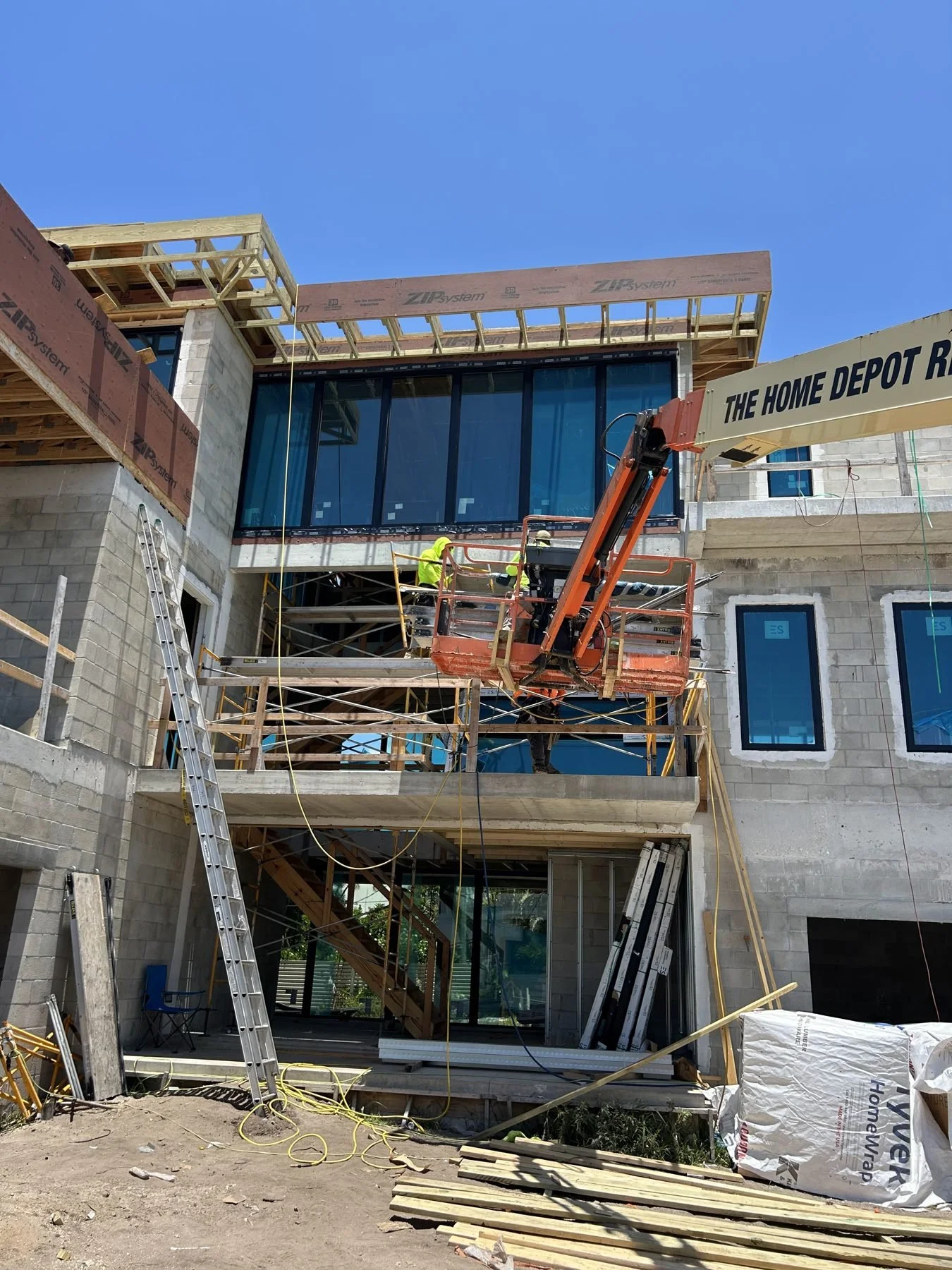 Bay Harbor impact window installation in progress with lift