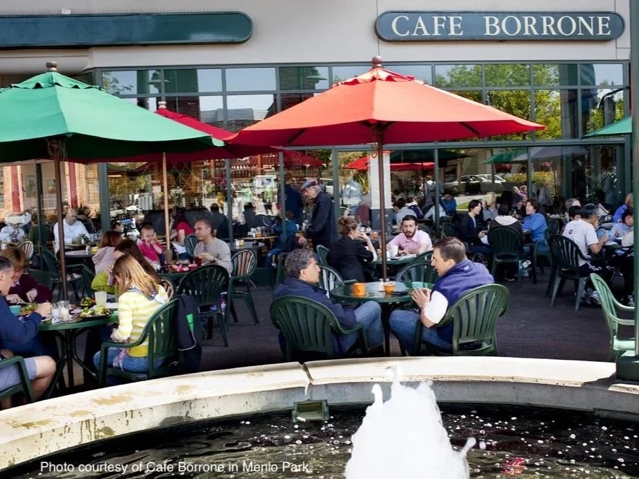 Outdoor seating at Cafe Borrone in downtown Menlo Park, California, a popular local café and community gathering spot.