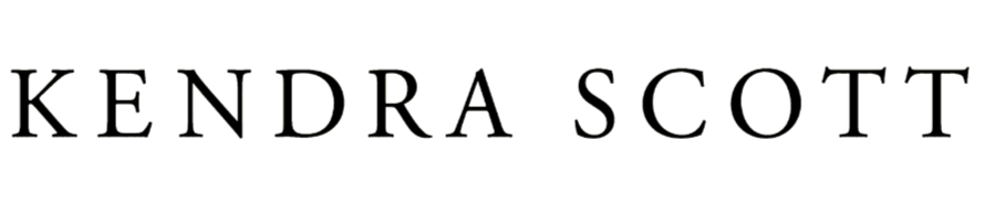 Kendra Scott logo in black text on a transparent background.