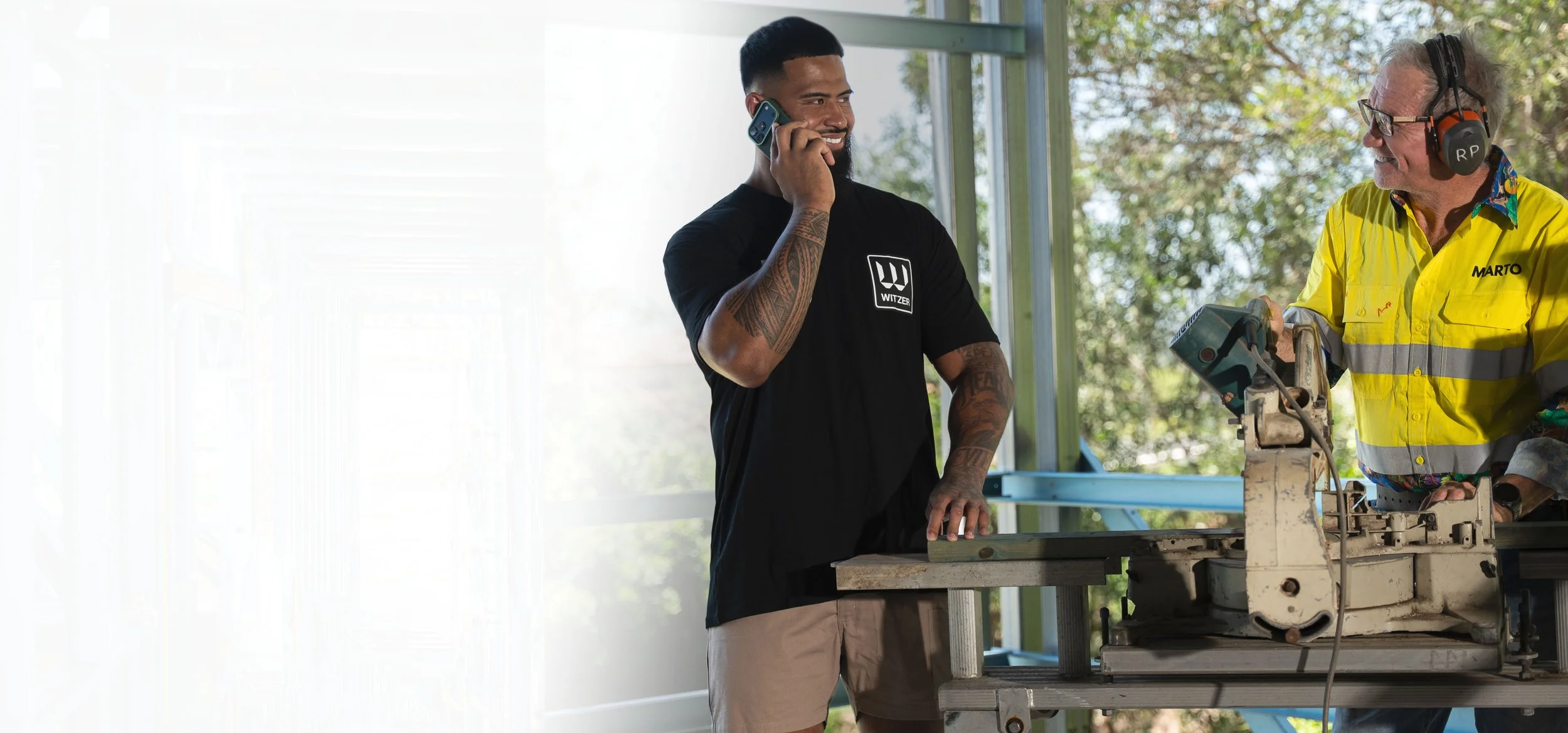 Payne Haas and Mardo on construction site