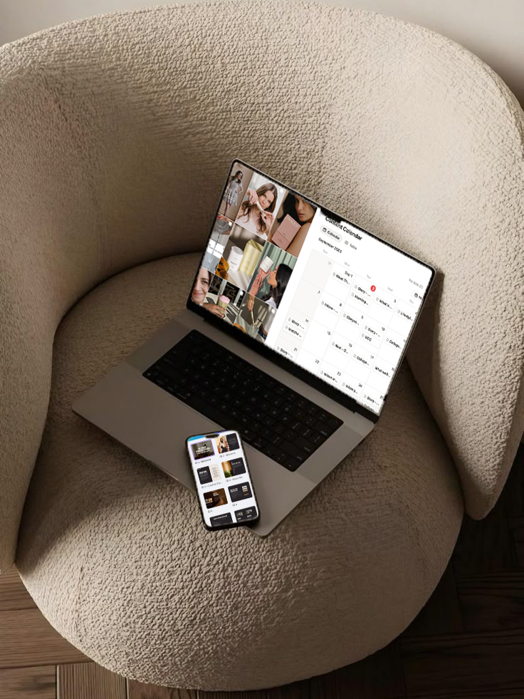Laptop and smartphone on a cozy, textured beige chair.