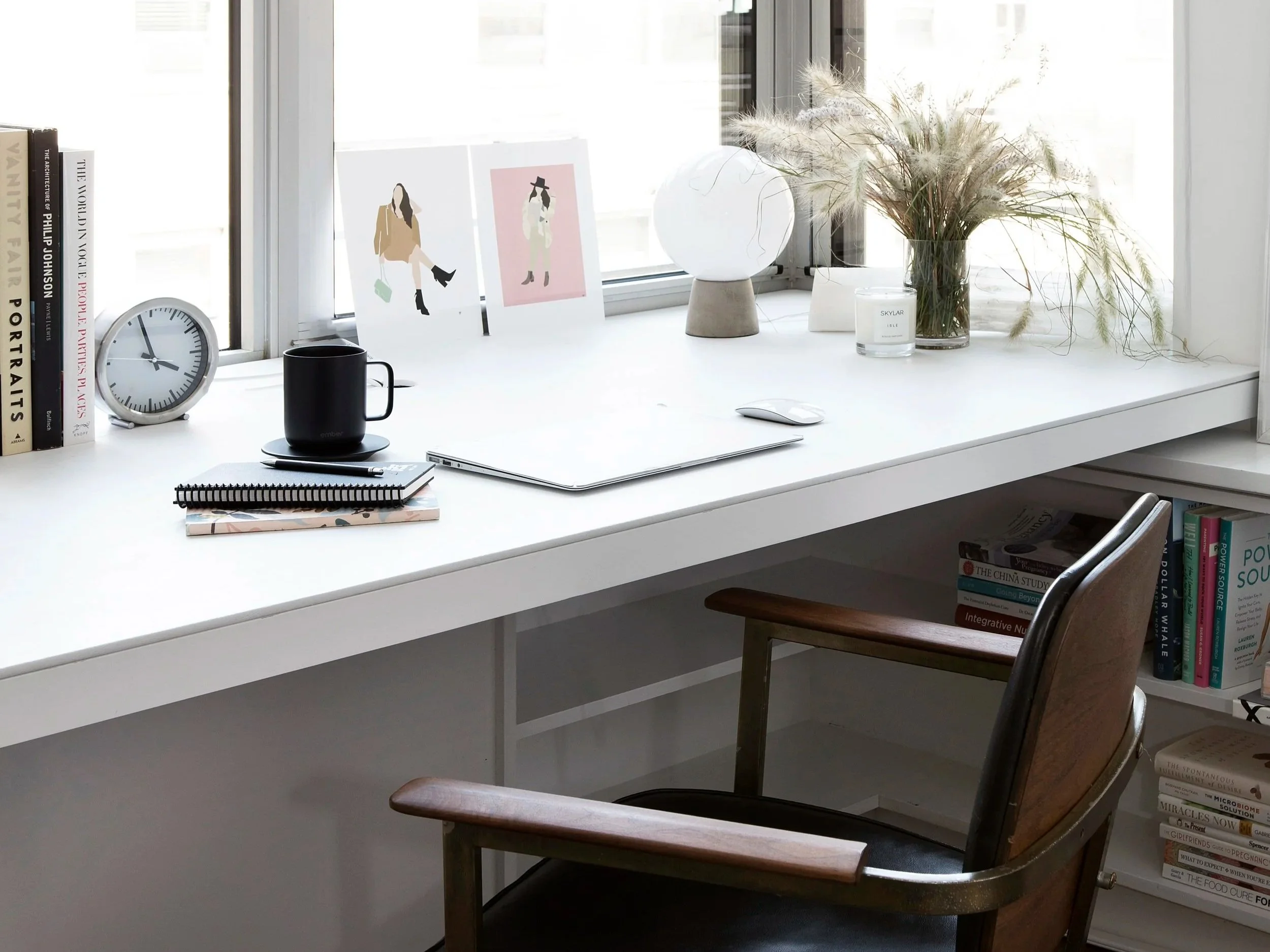 built in desk top at a manhattan apartment combination and renovation utilizing the existing space to create a custom worktop