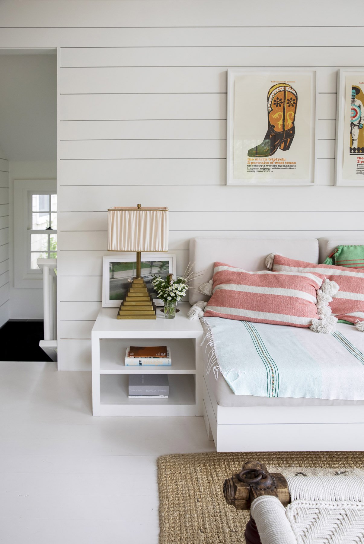 A built-in bed with integrated side tables that keeps the room open and architectural, avoiding the visual weight of excess furniture. Designed for the Montauk beach house, it brings calm clarity to the floor plan and lets the space breathe.