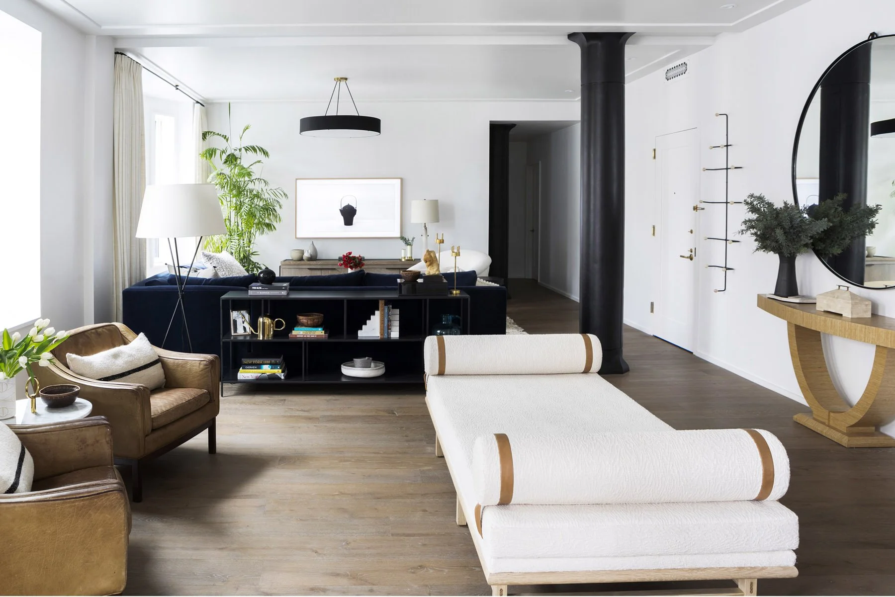 A custom daybed that bridges the entry and living room, offering added seating while shaping a graceful arrival moment. Inspired by mid-century forms, it feels timeless and contemporary – a piece that grounds the Brooklyn Heights Apartment with ease.